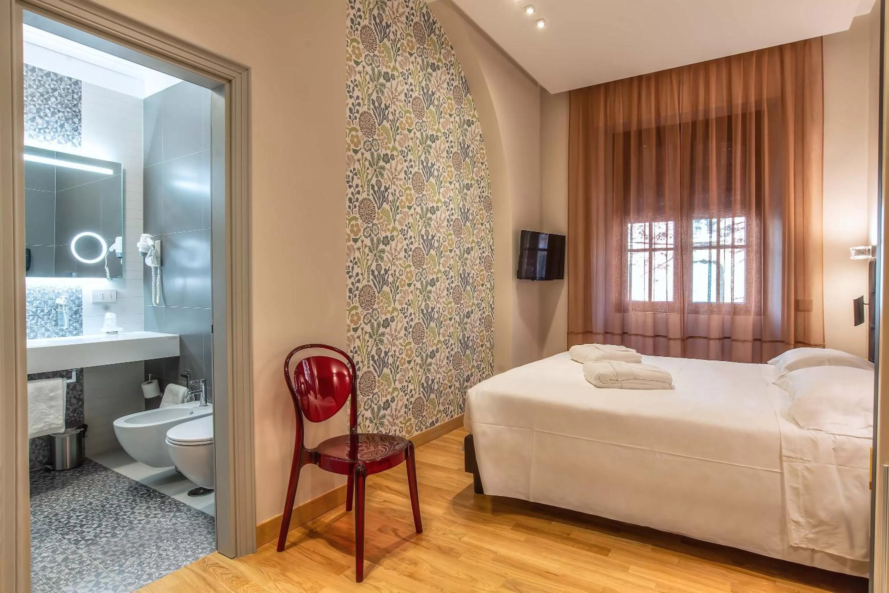 Bed in Albergo Etico Roma