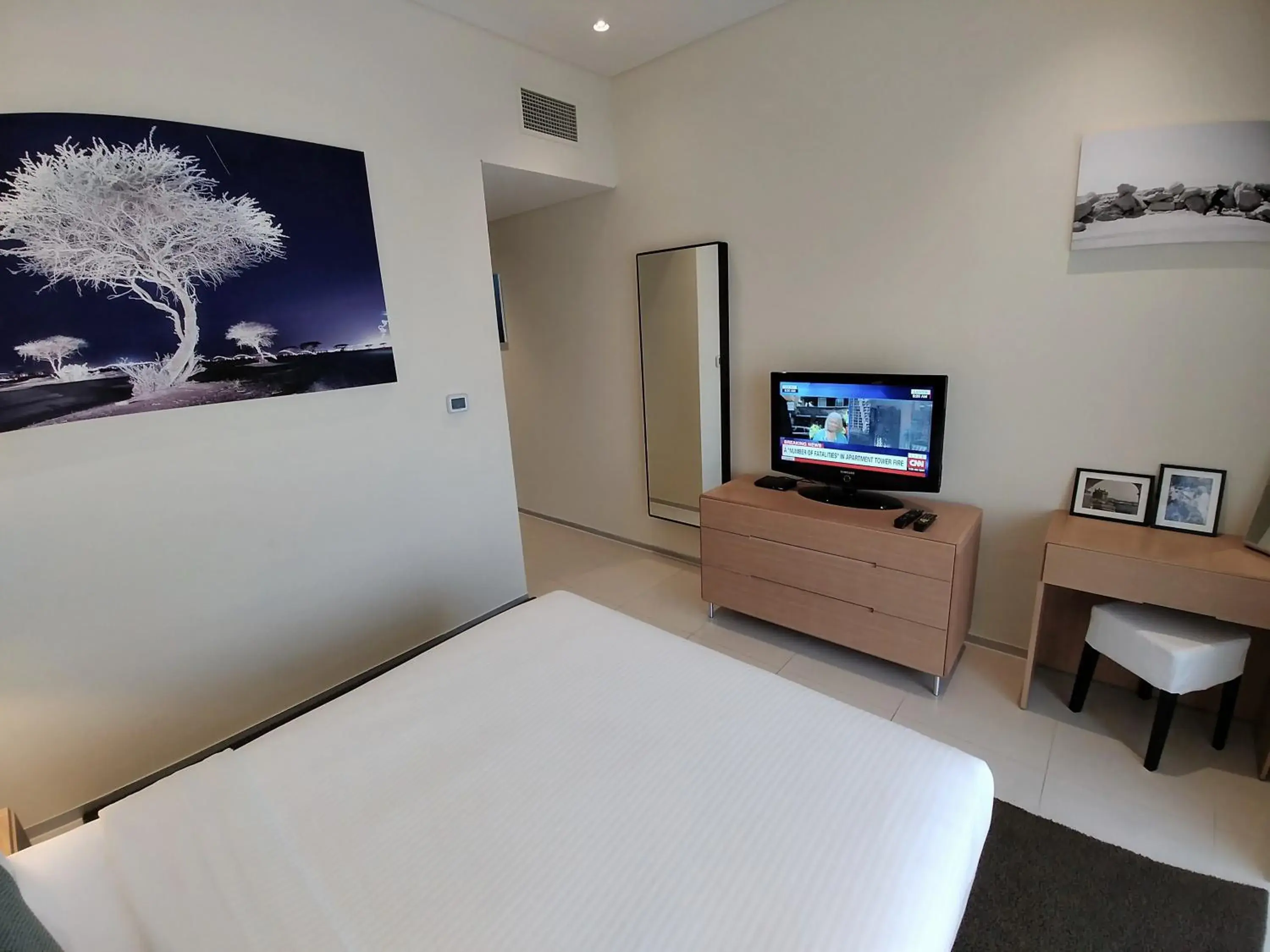 Bedroom, TV/Entertainment Center in Ascott Park Place Dubai