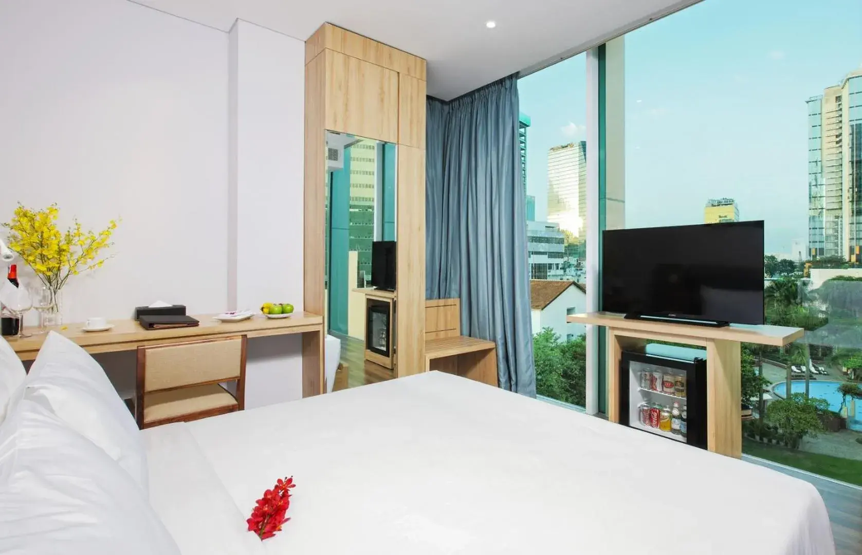 Bedroom, Bed in RAMADA ENCORE BY WYNDHAM SAIGON D1 - Formerly M Boutique Hotel Saigon