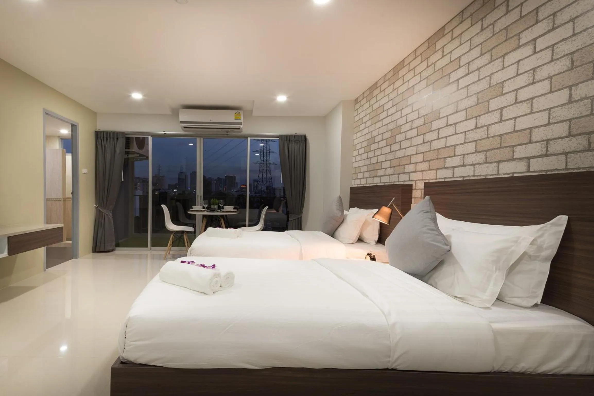 Bed in Q Space Residence