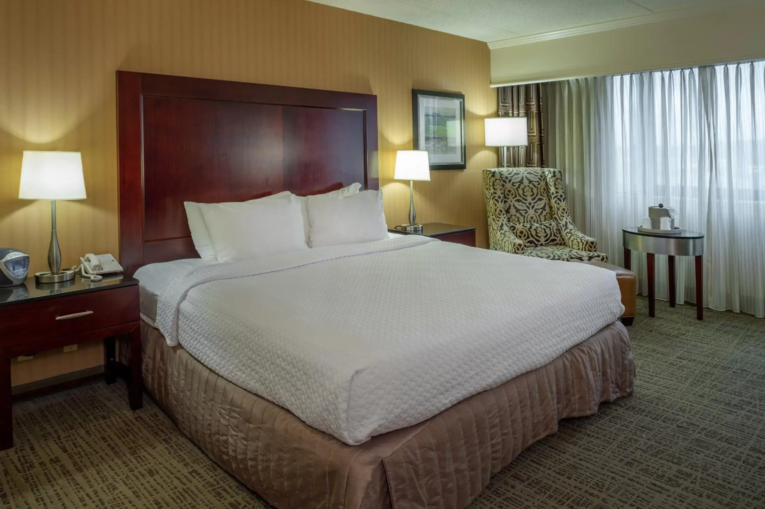 Photo of the whole room, Bed in Crowne Plaza Hotel St. Louis Airport, an IHG Hotel