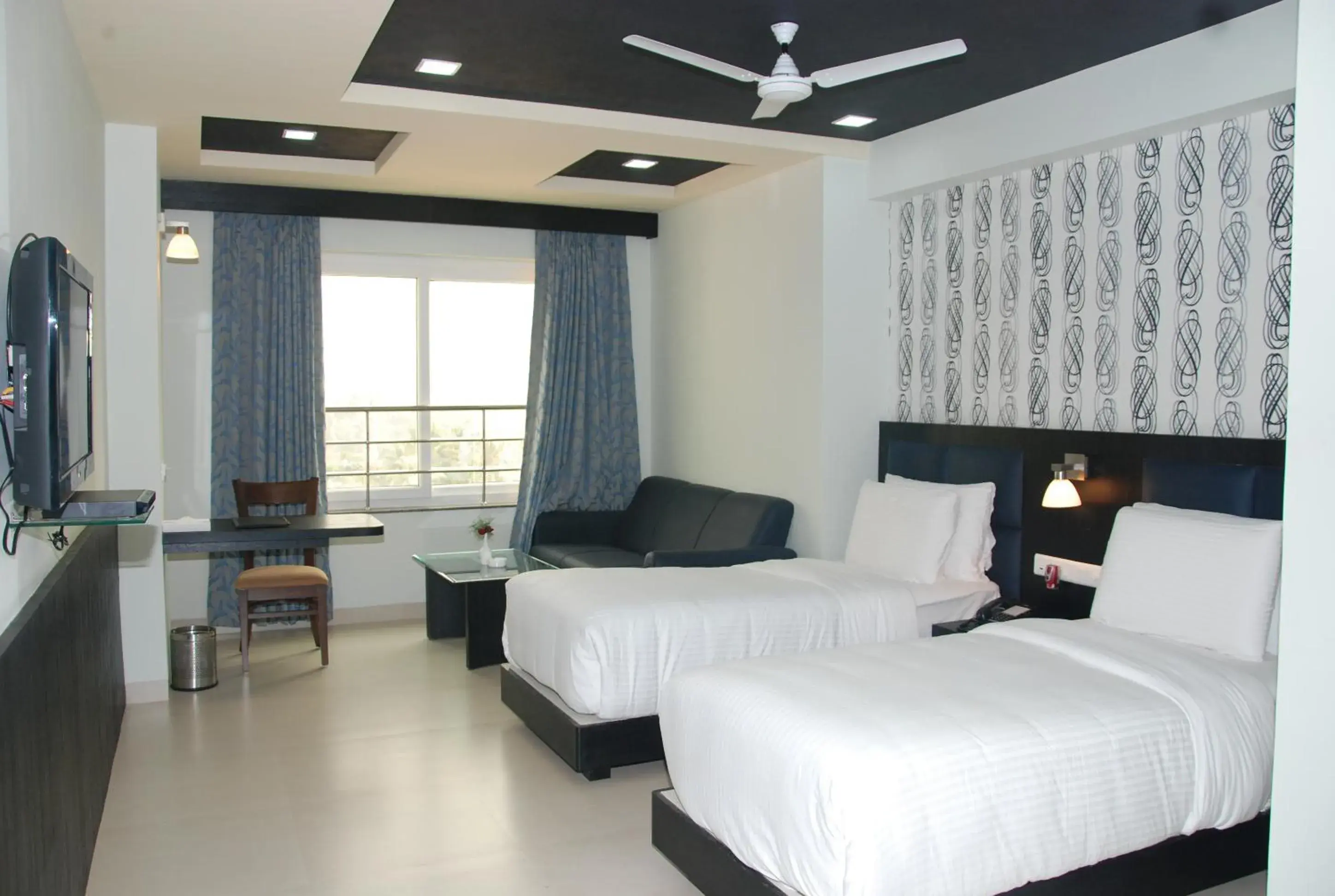 Bed in Pride Ananya Resort Puri