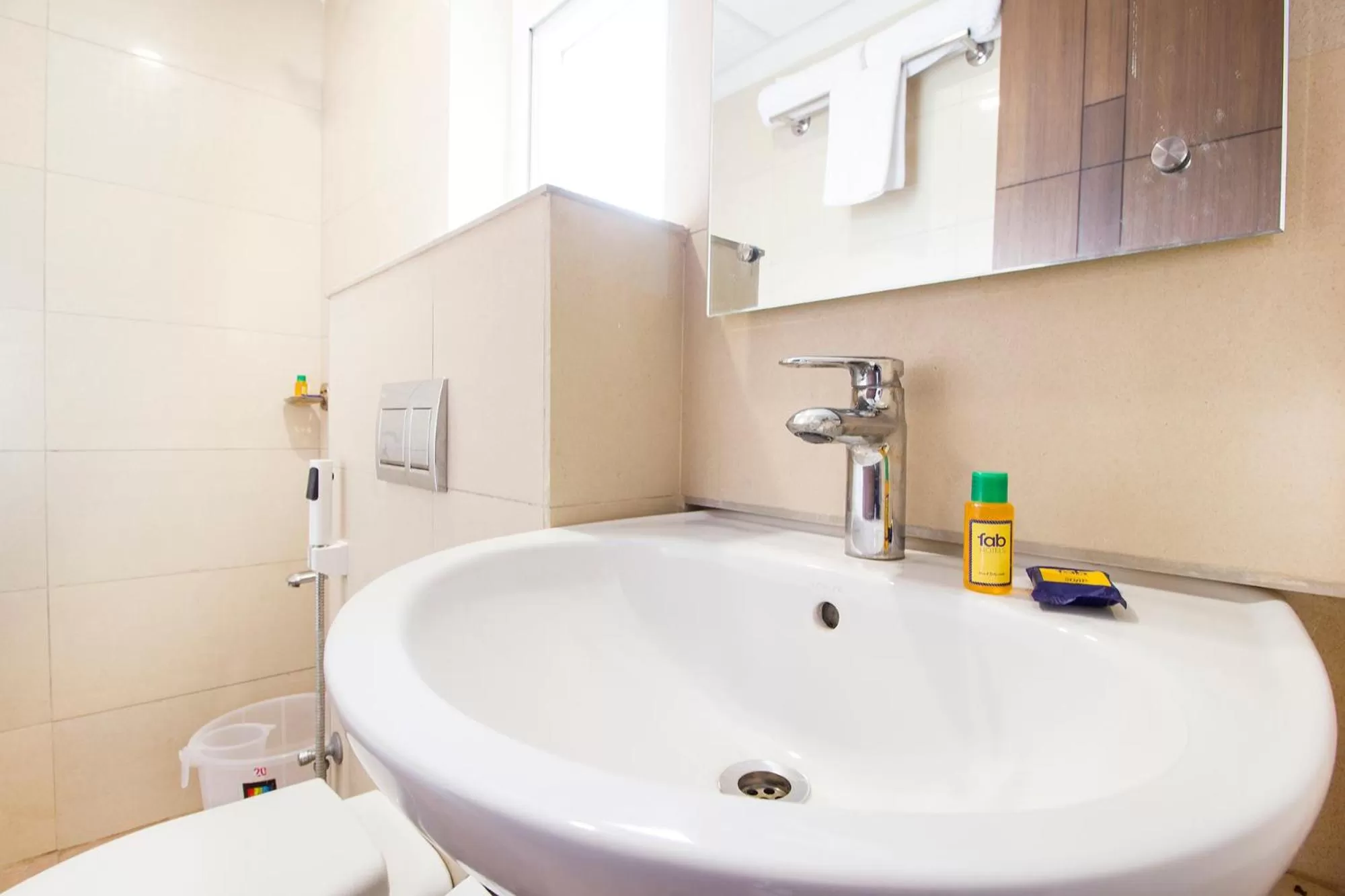 Bathroom in FabHotel Limestone Suites -750M from Yashoda Hospitals, Somajiguda