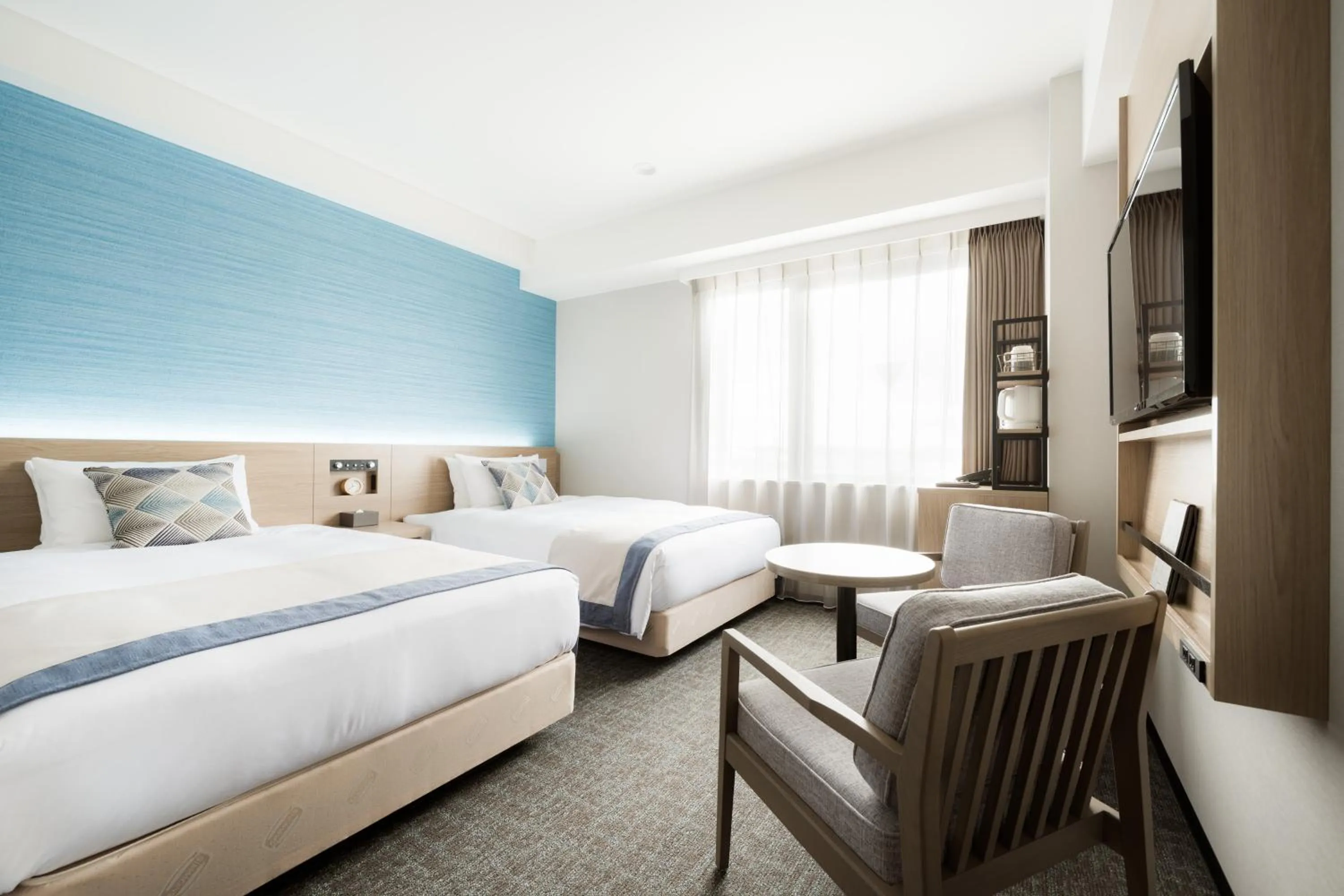 Bed in Tissage Hotel Naha by Nest