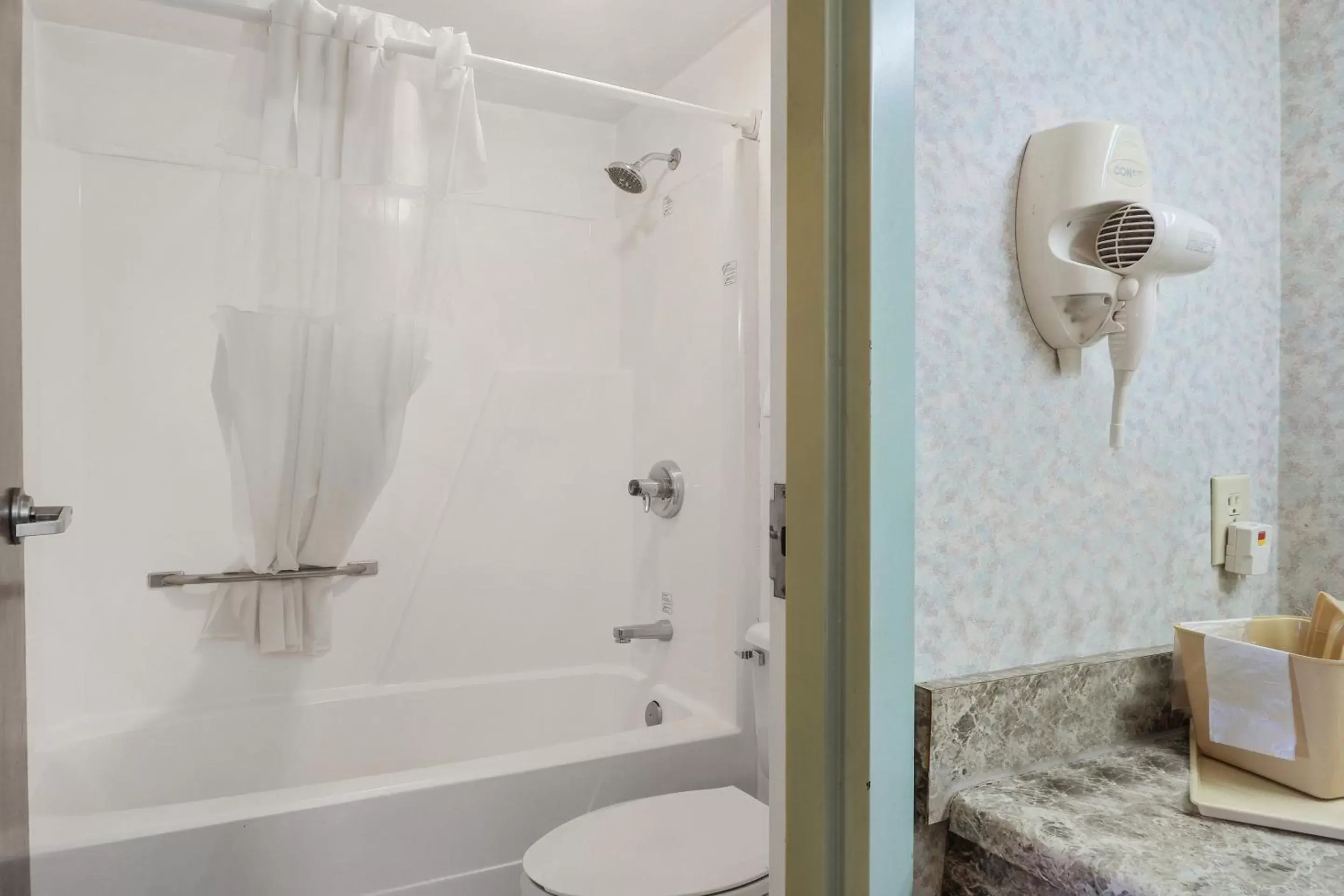 Bathroom in Lonestar Inn & Suites, Erick OK Hwy 40 BY OYO