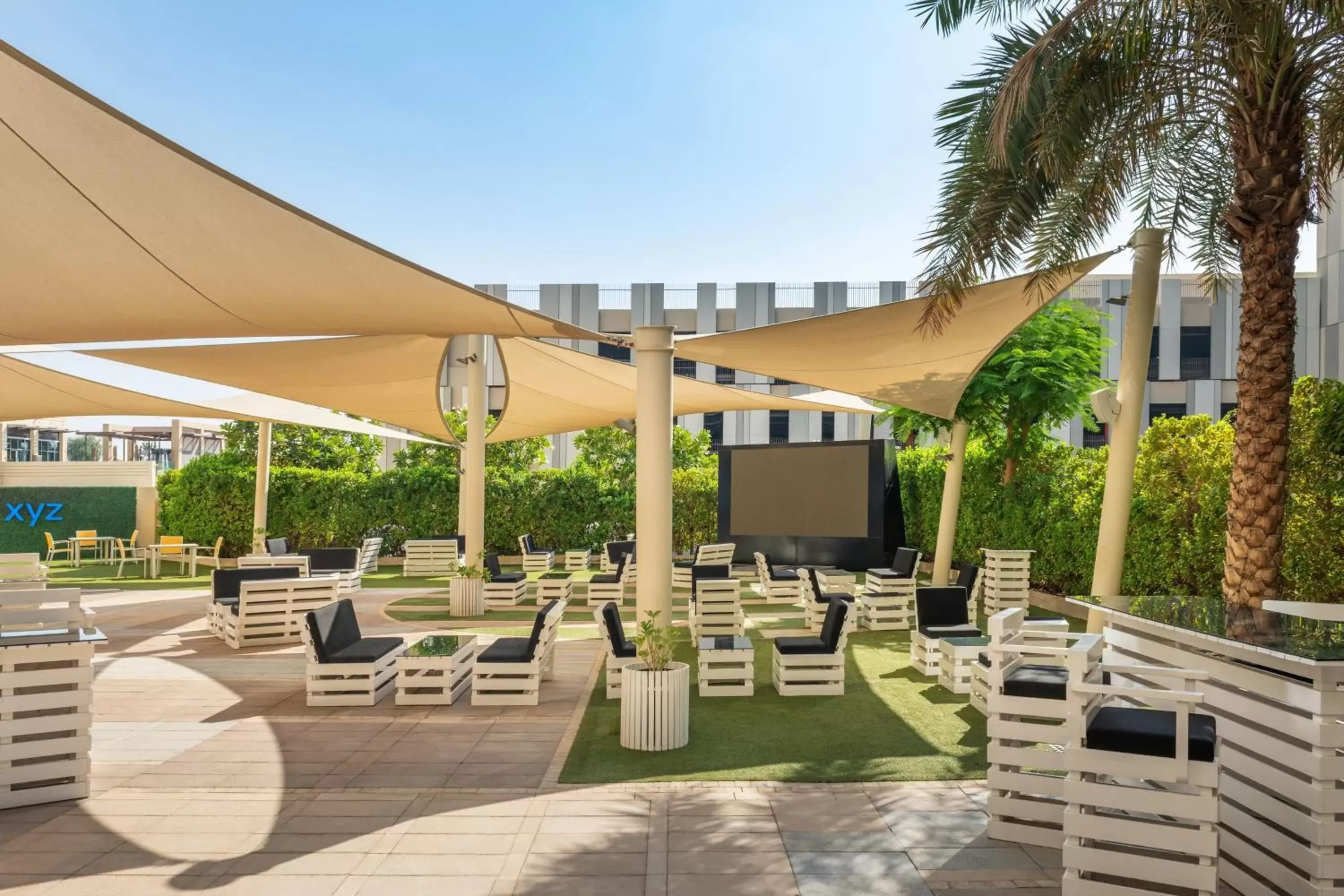 Lounge or bar, Swimming Pool in Aloft Al Ain