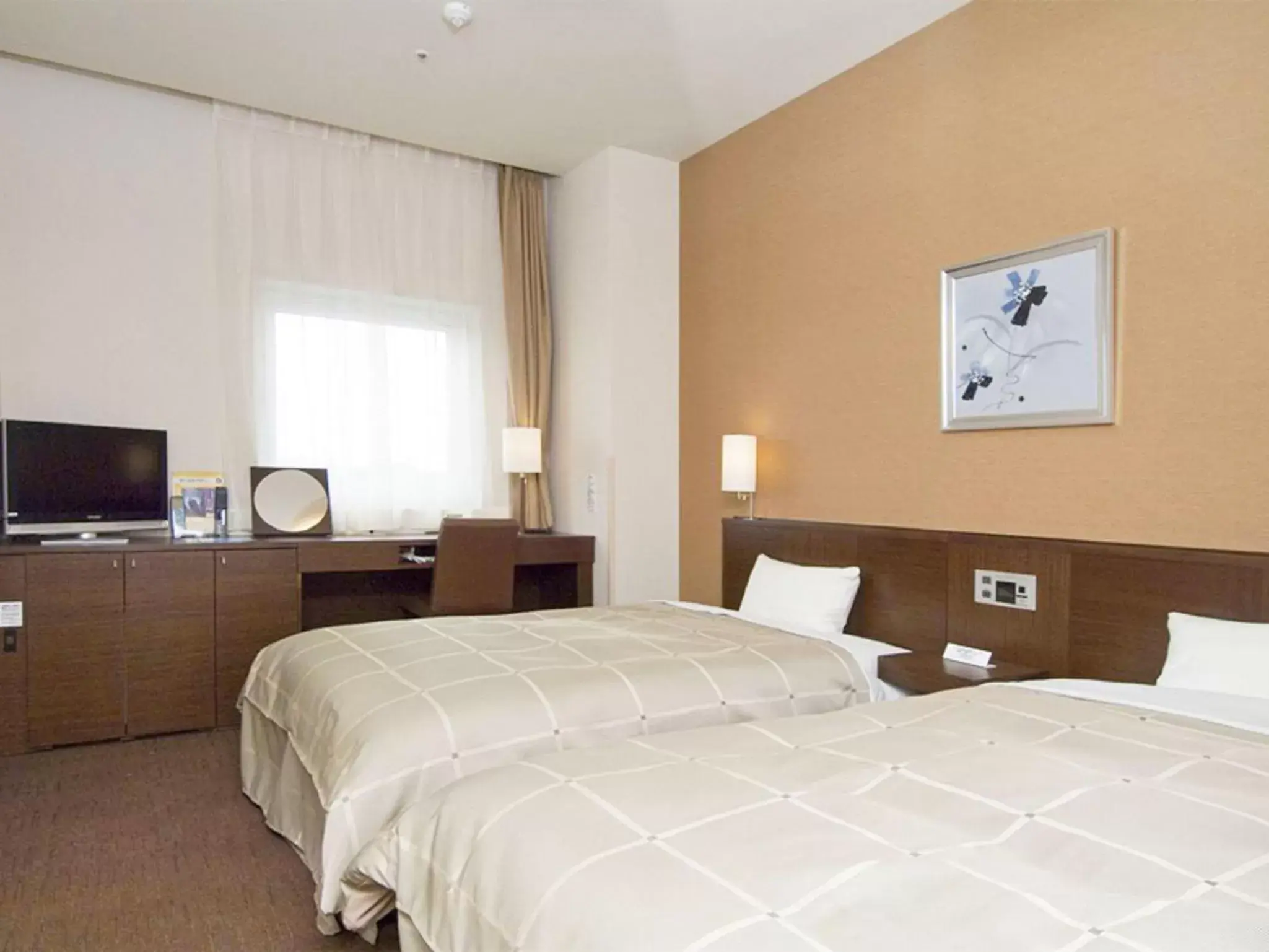 Bed in Hotel Route-Inn Higashimuroran Ekimae