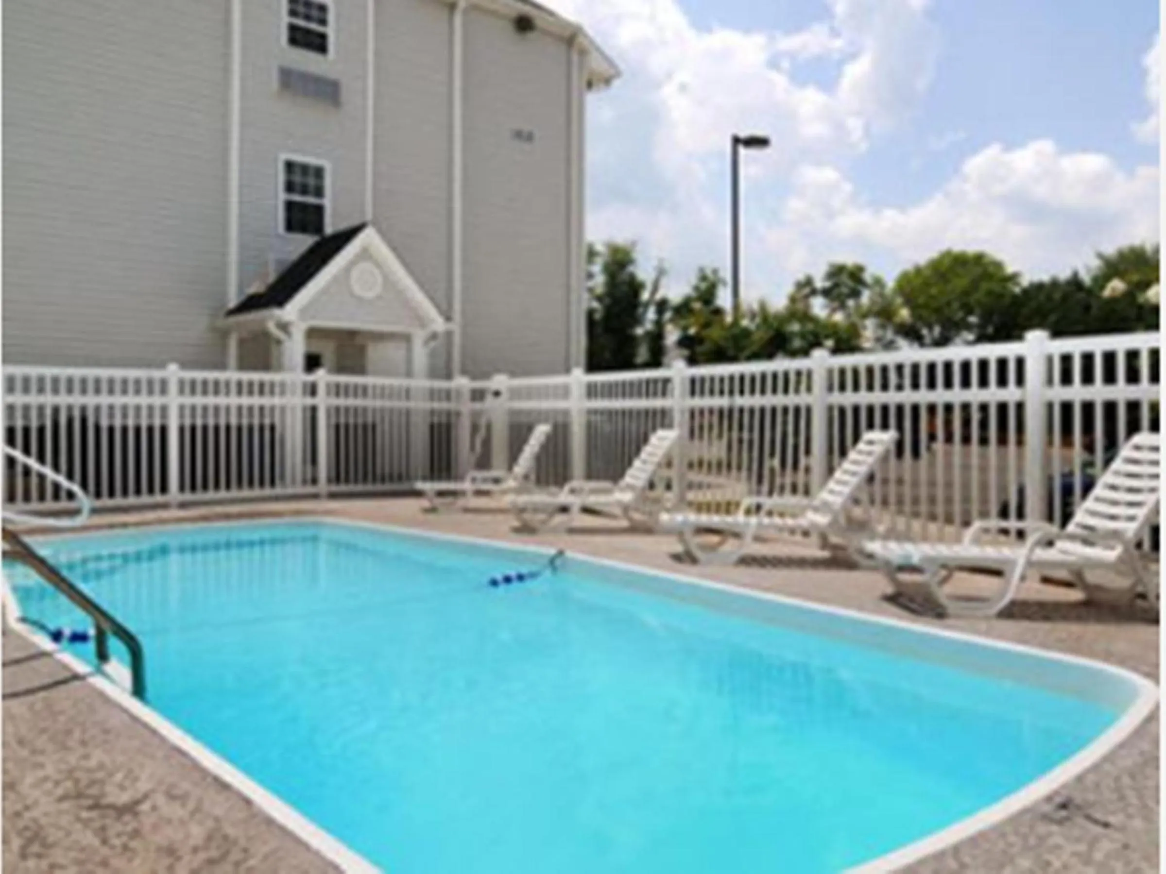 Swimming pool in Microtel Inn & Suites by Wyndham Huntsville