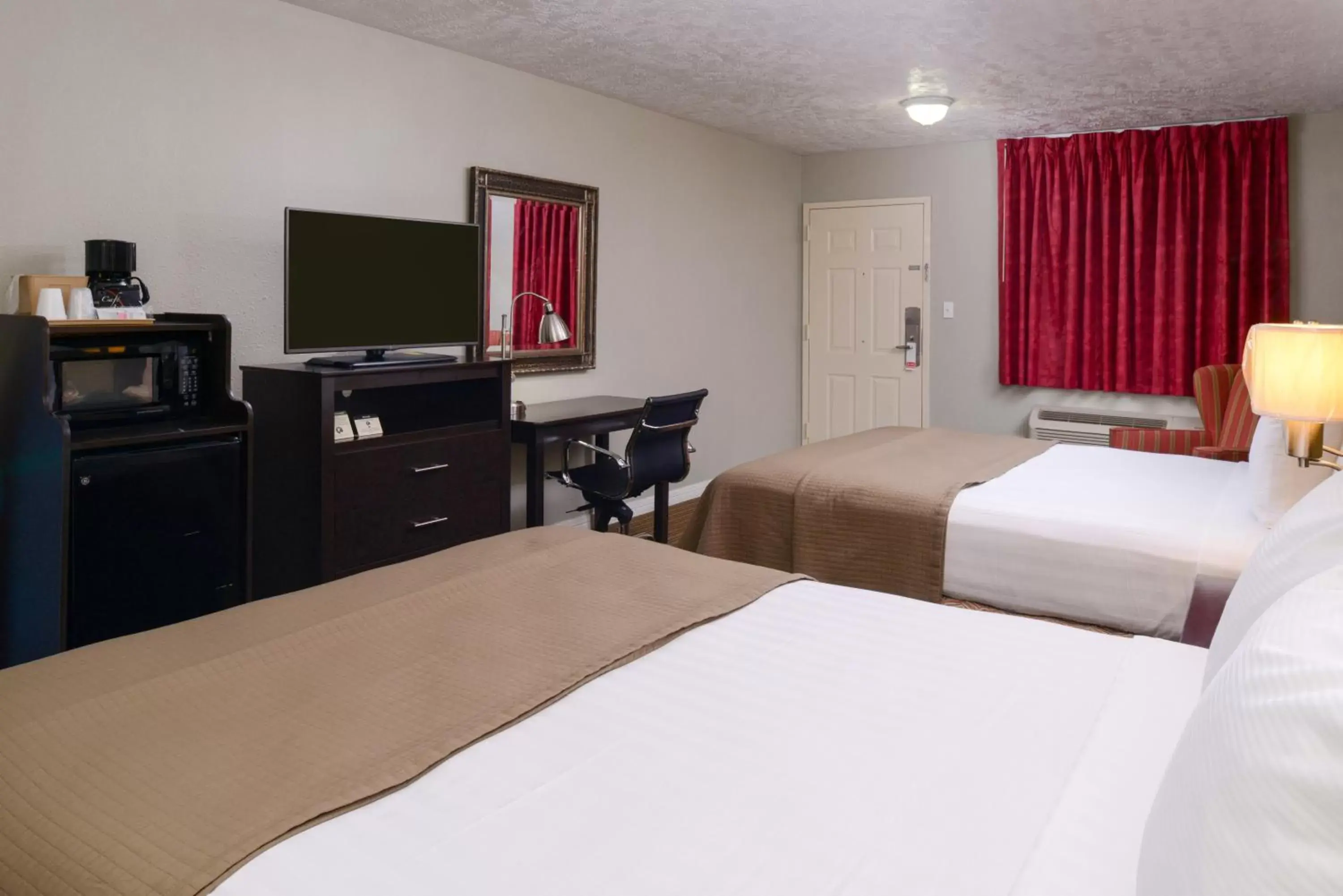 Bed in Americas Best Value Inn & Suites Waller Prairie View