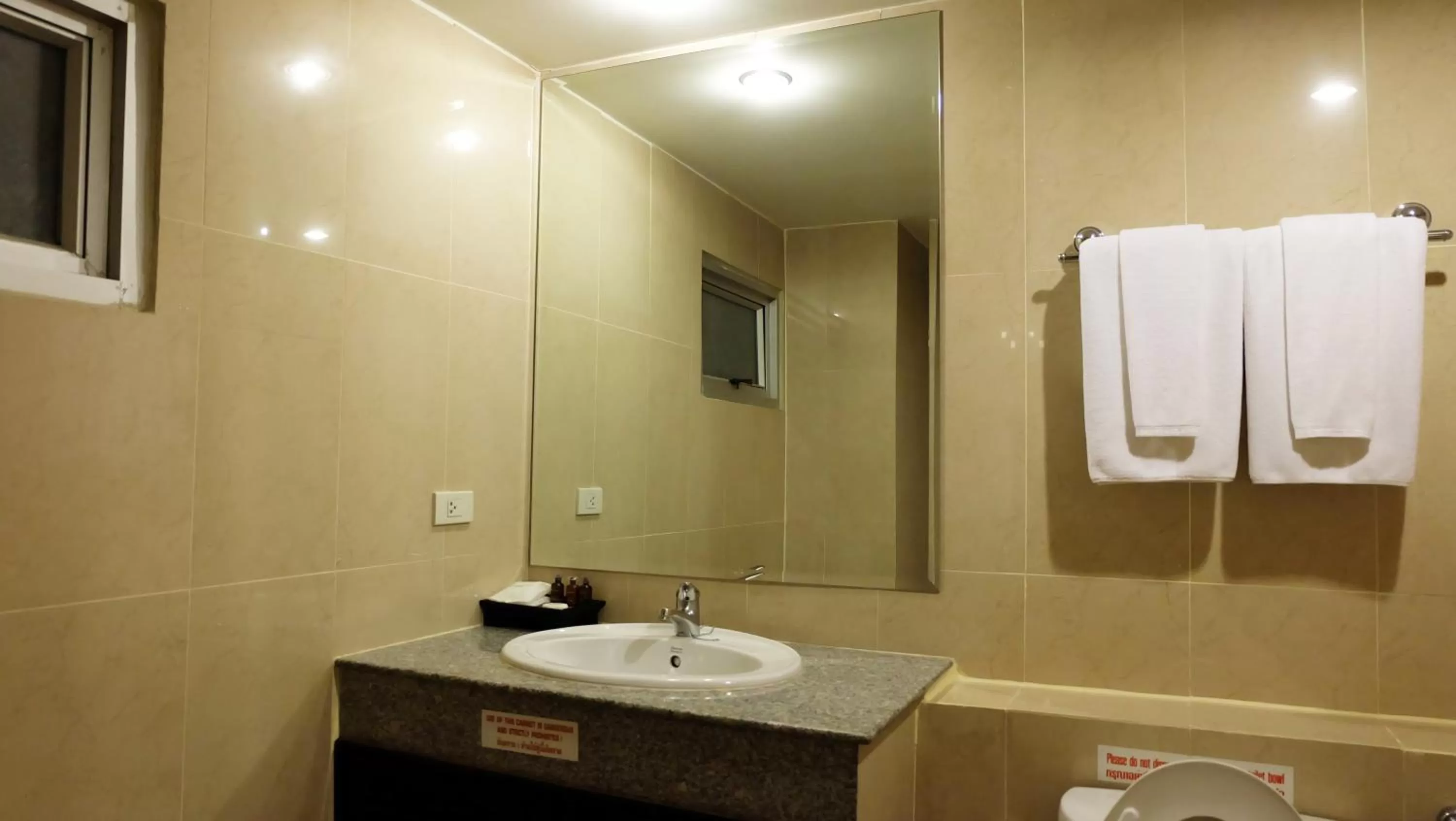 Bathroom in Grand Business Inn