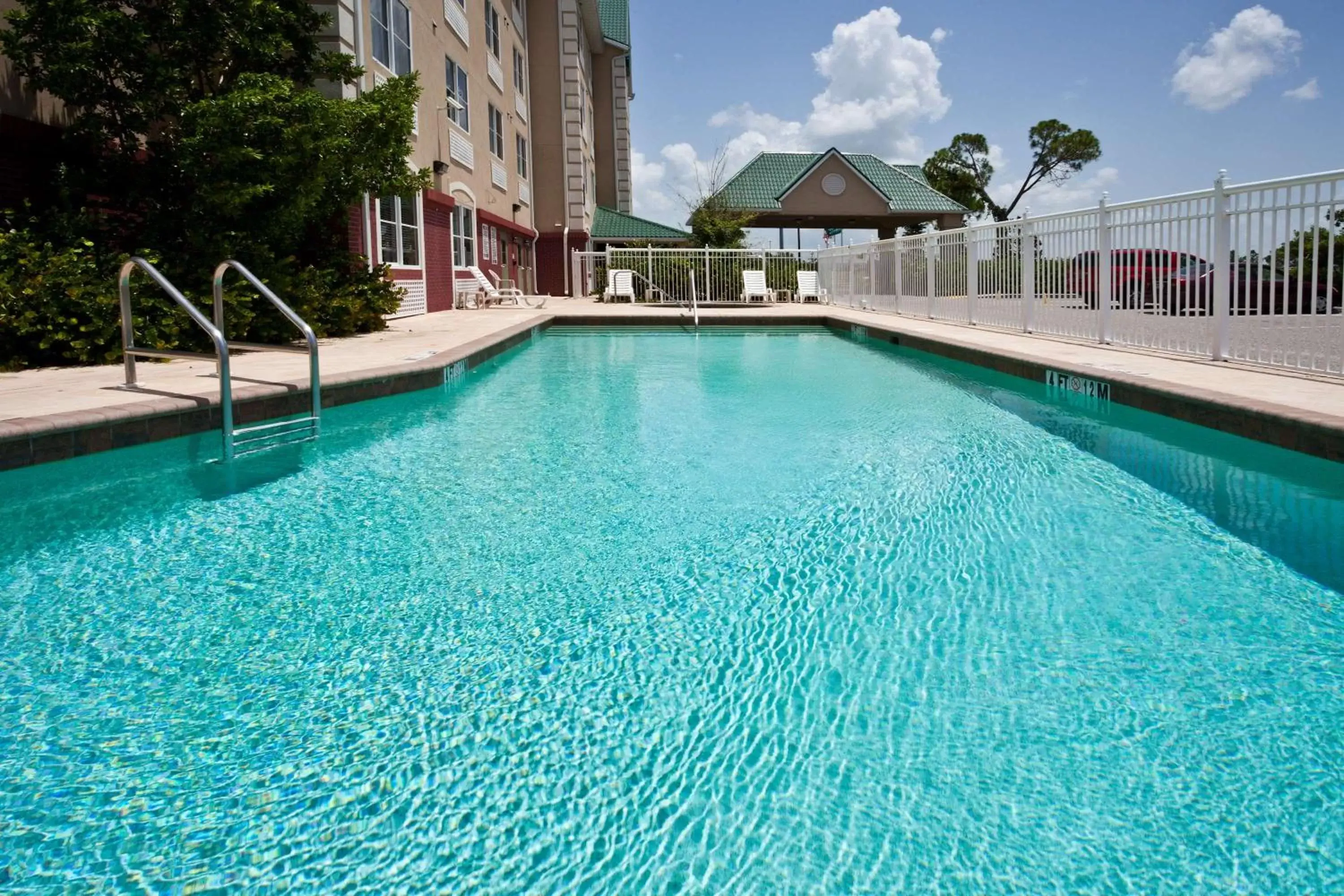 Activities, Swimming Pool in Country Inn & Suites by Radisson, Port Charlotte, FL