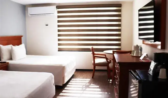 Bed in Araiza Palmira Hotel y Centro de Convenciones