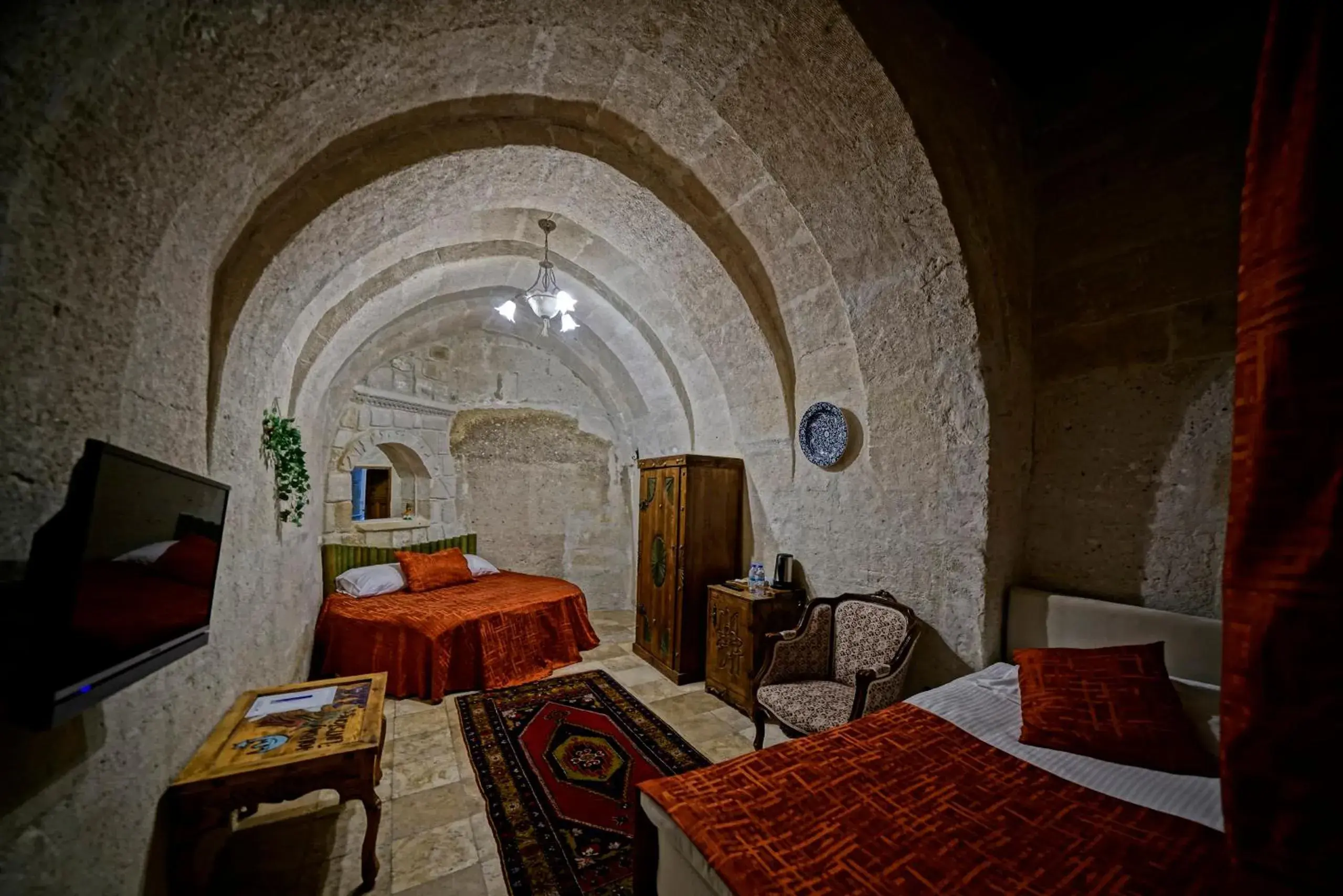 Bed in Holiday Cave Hotel