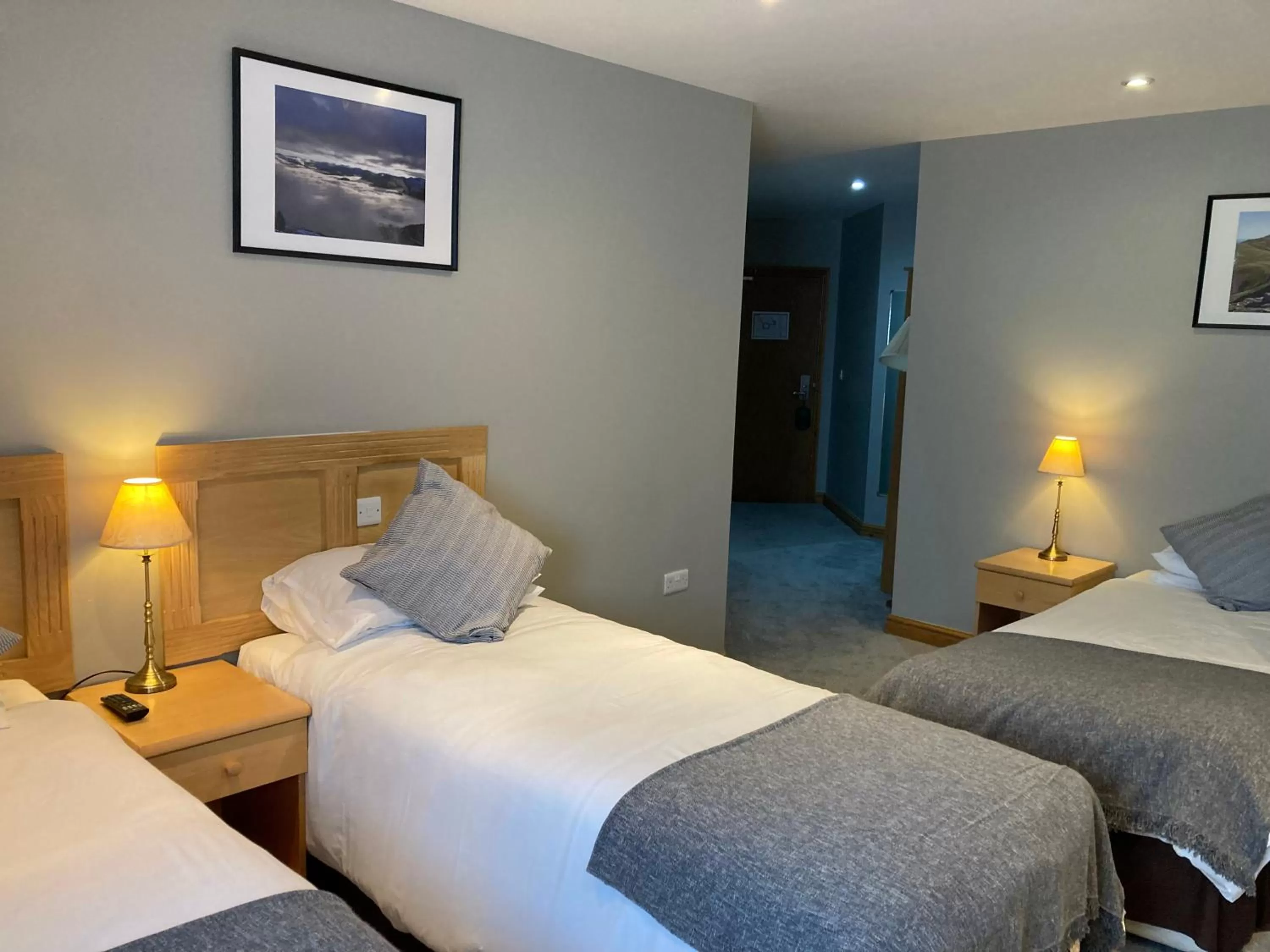 Bed in Washington Central Hotel and Sleepwell Inn