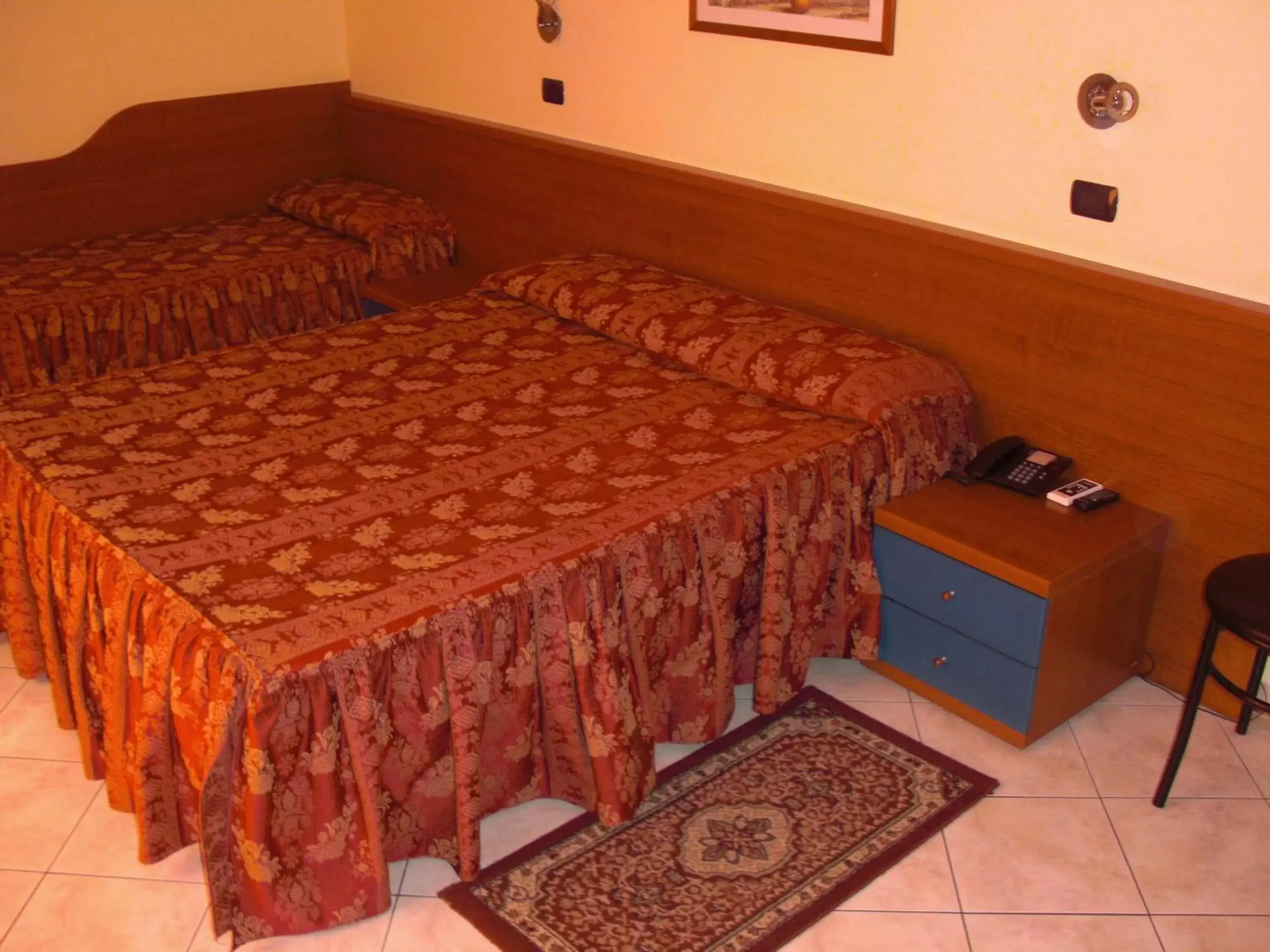 Bed in Hotel Legnano