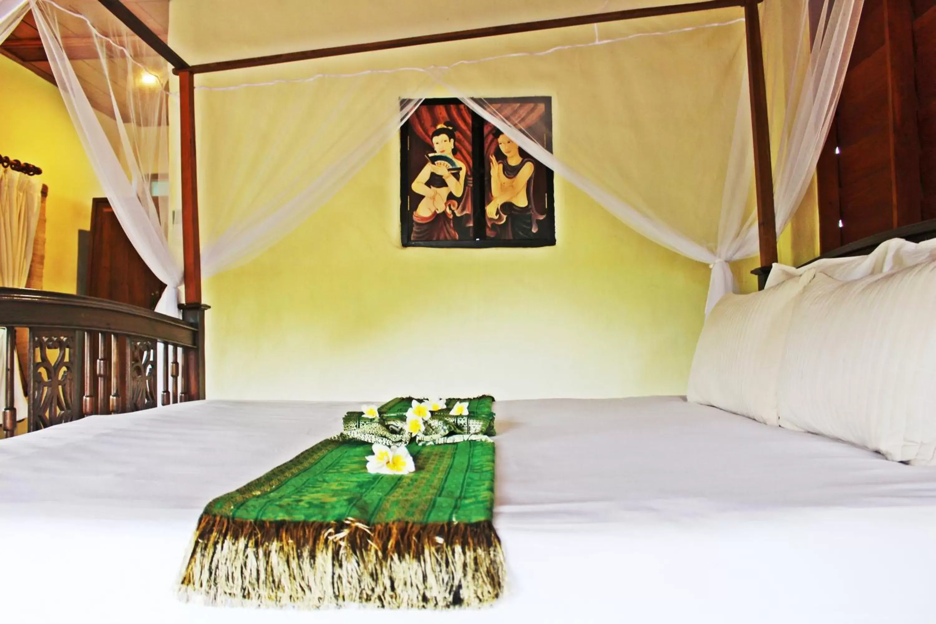 Bed in Pai Vimaan Resort