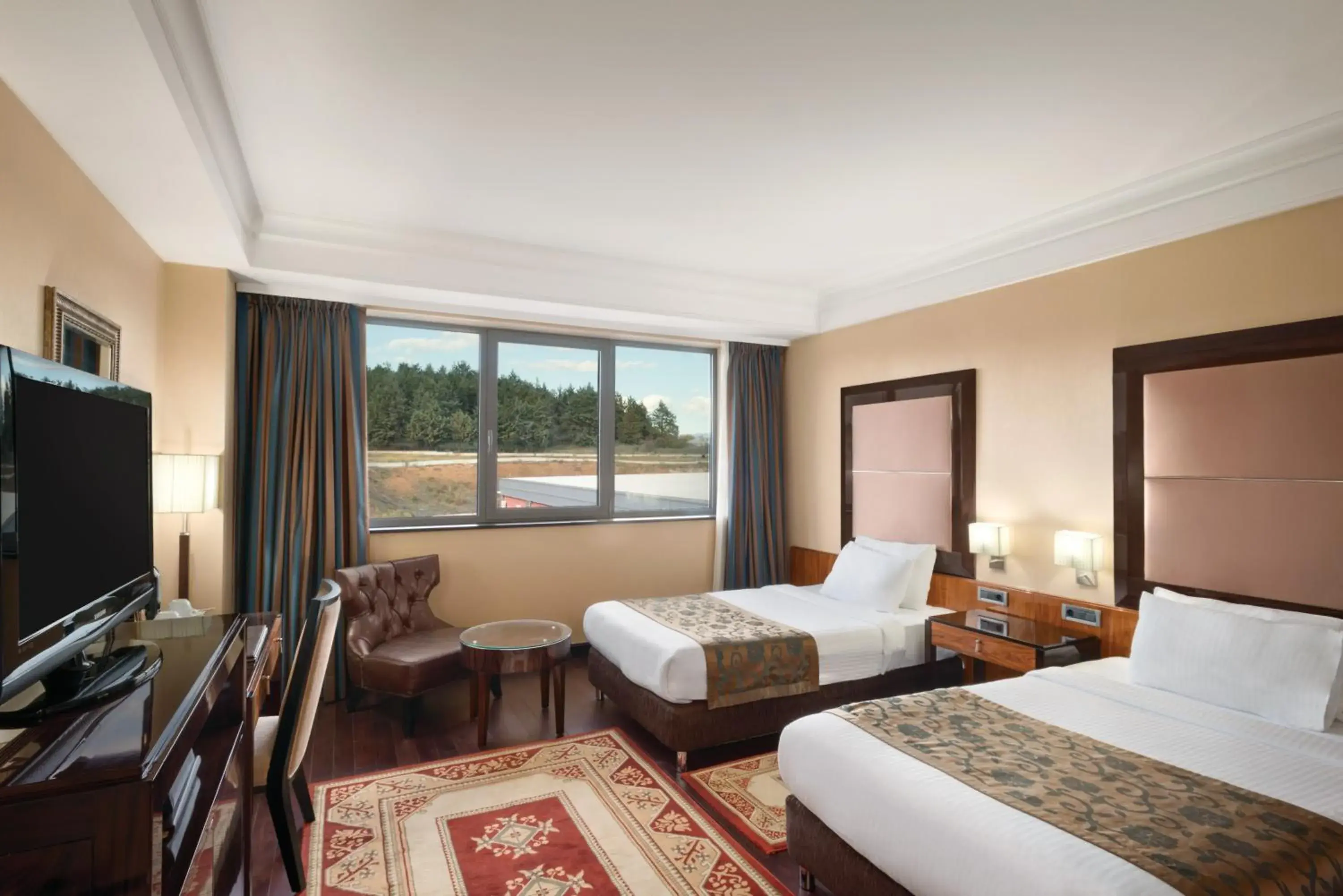 Photo of the whole room, Bed in Ramada Plaza by Wyndham Gevgelija Photo of the whole room, Bed in Ramada Plaza by Wyndham Gevgelija