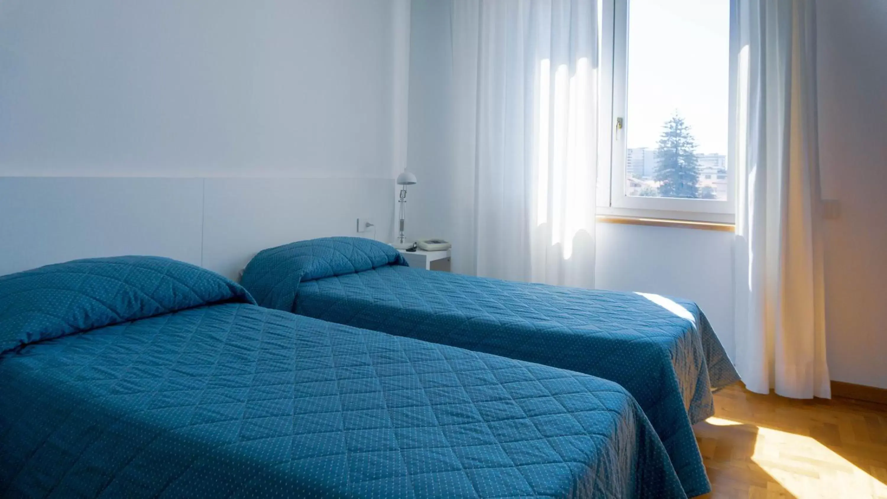 Bed in Hotel Mistral
