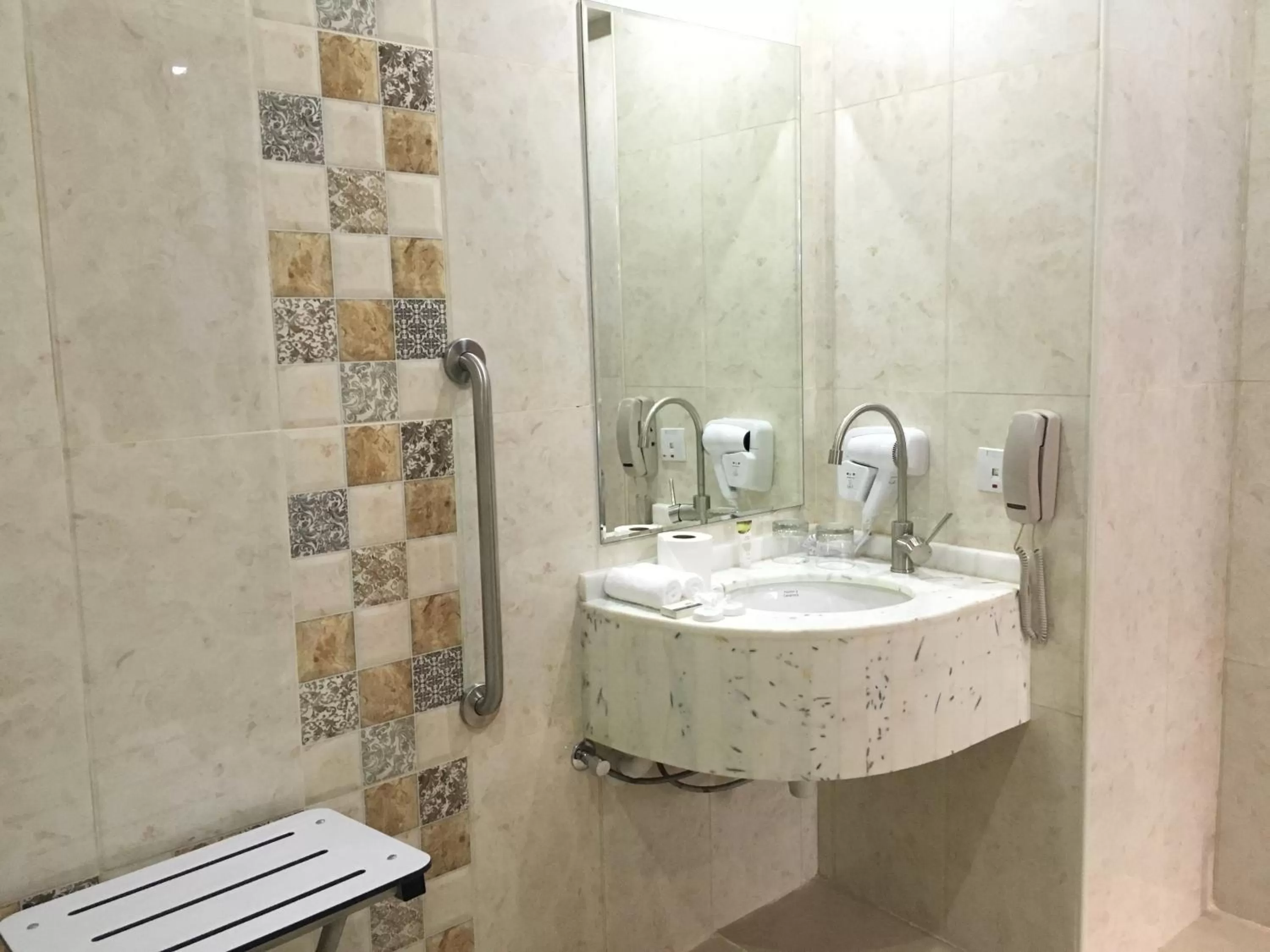 Bathroom in Royal Tulip Hotel LLC