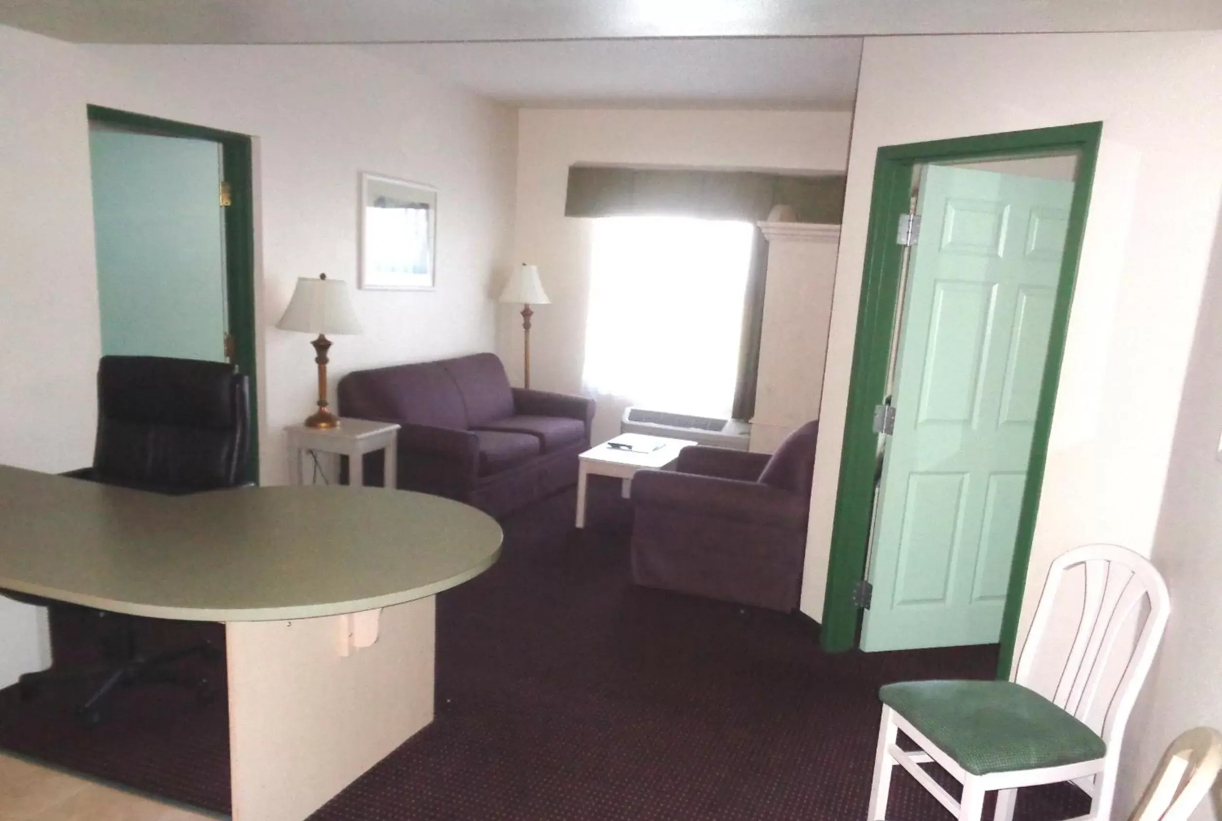 Living room in Allure Suites of Fort Myers Living room in Allure Suites of Fort Myers