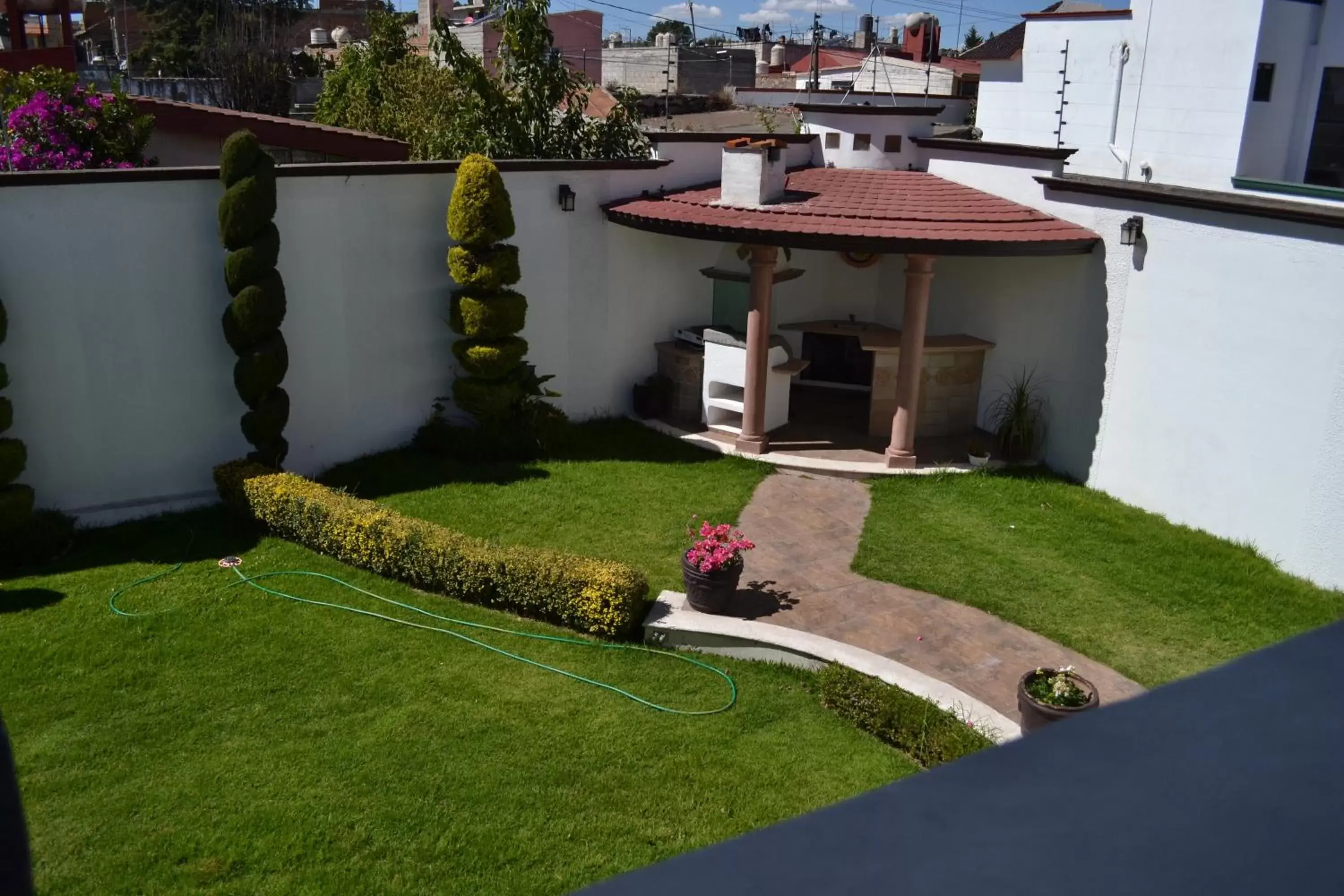 BBQ facilities in La Aurora Hotel Like Home