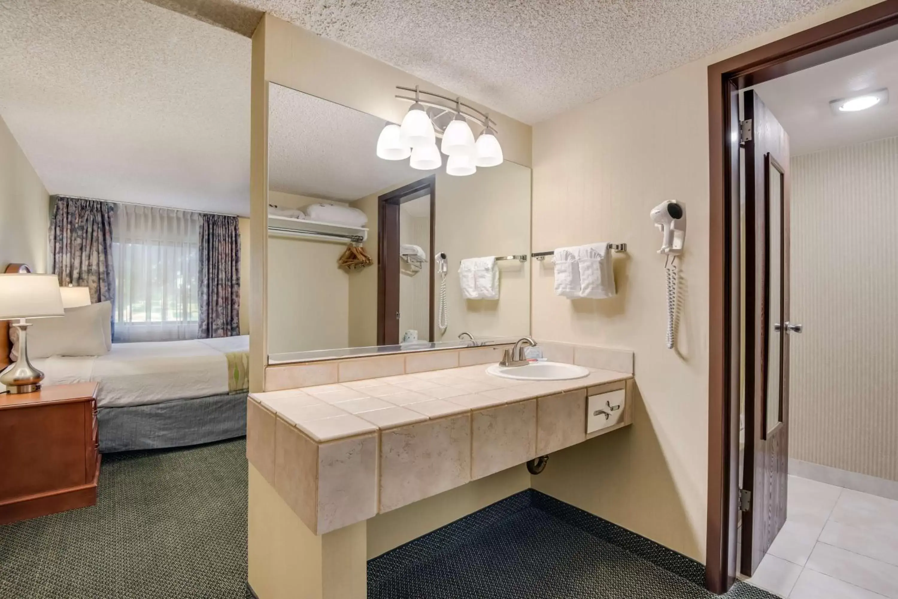 Bathroom in SureStay Plus Hotel by Best Western Reno Airport