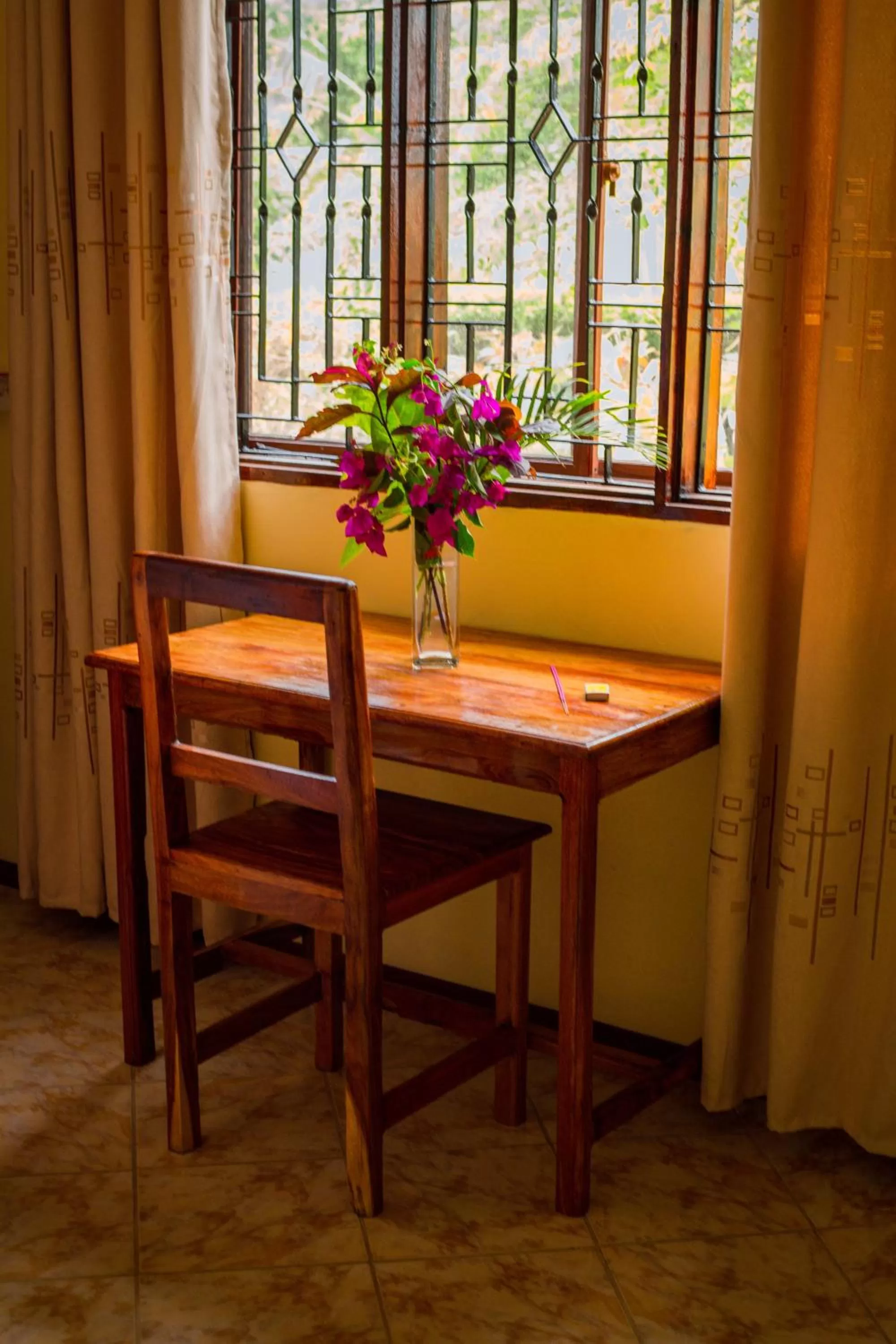 Bed, Dining Area in Mikoko Beach & Cottages