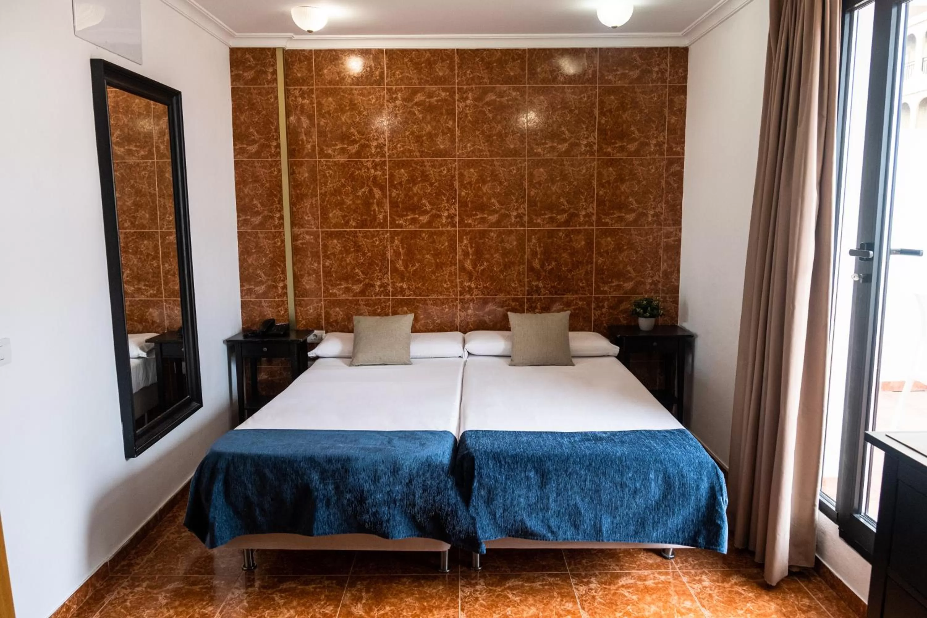 Bed in Hotel Adonis Capital