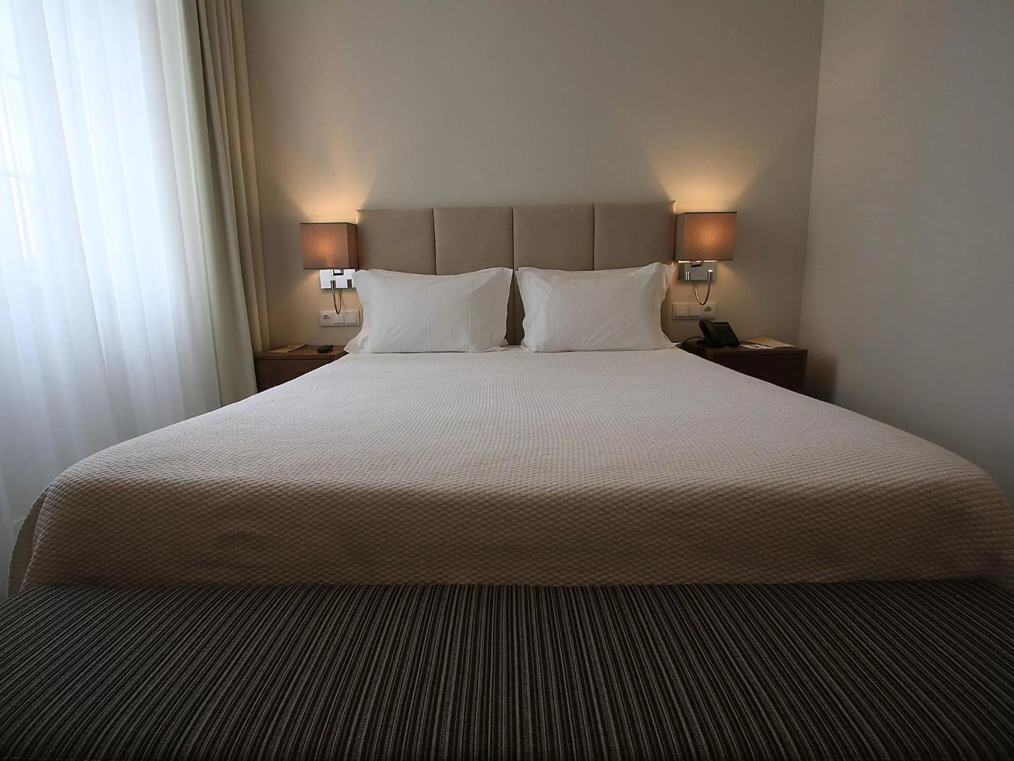 Bed in Consolata Hotel