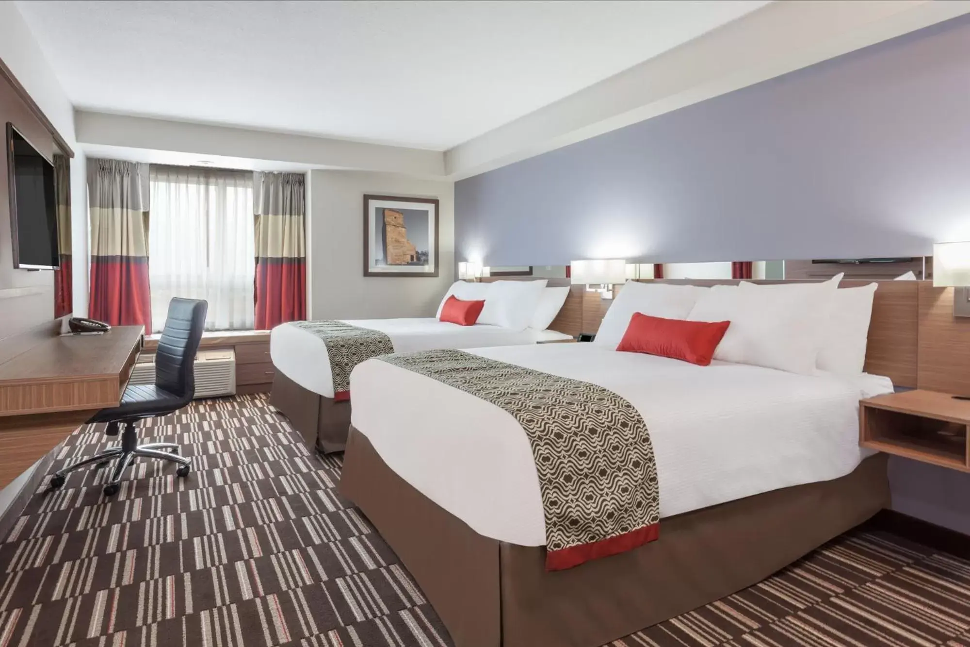 Bed in Microtel Inn & Suites by Wyndham Fort McMurray