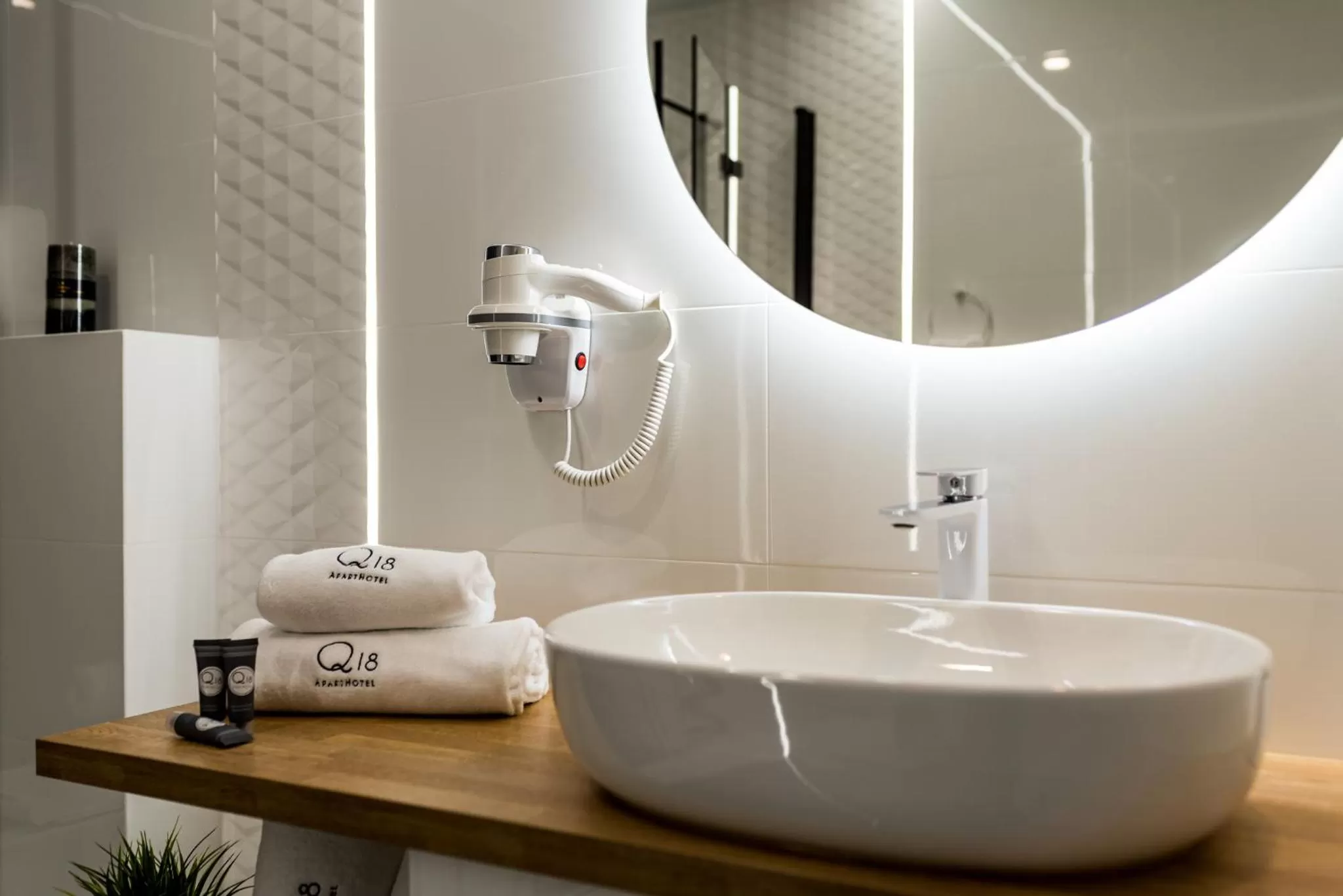 Bathroom in Q18 ApartHotel