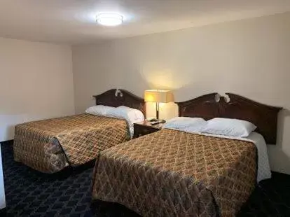 Bed in Bing's Motel