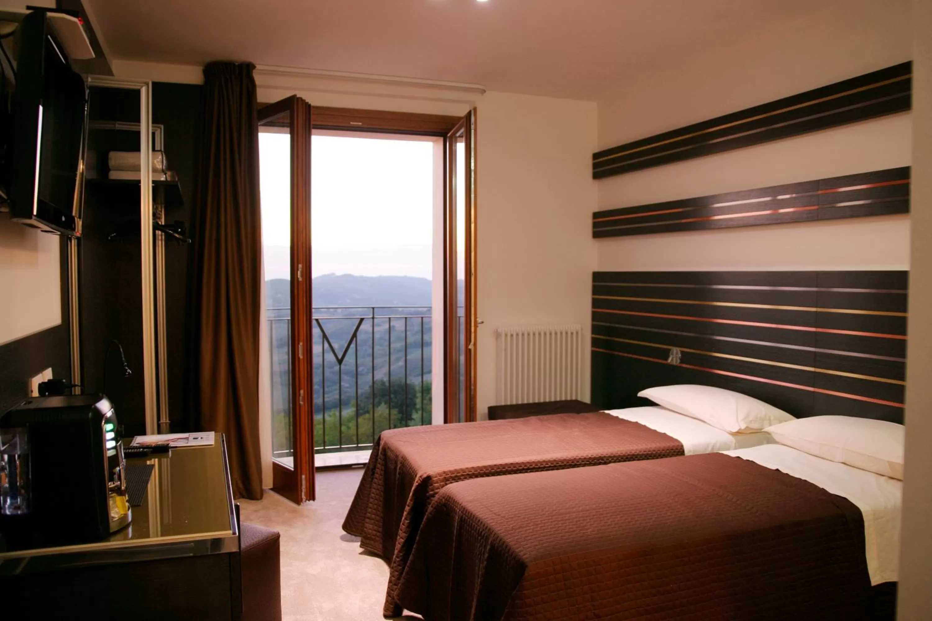 Photo of the whole room, Bed in Albergo Diffuso Spa - Il Poggetto tra Urbino & San Marino