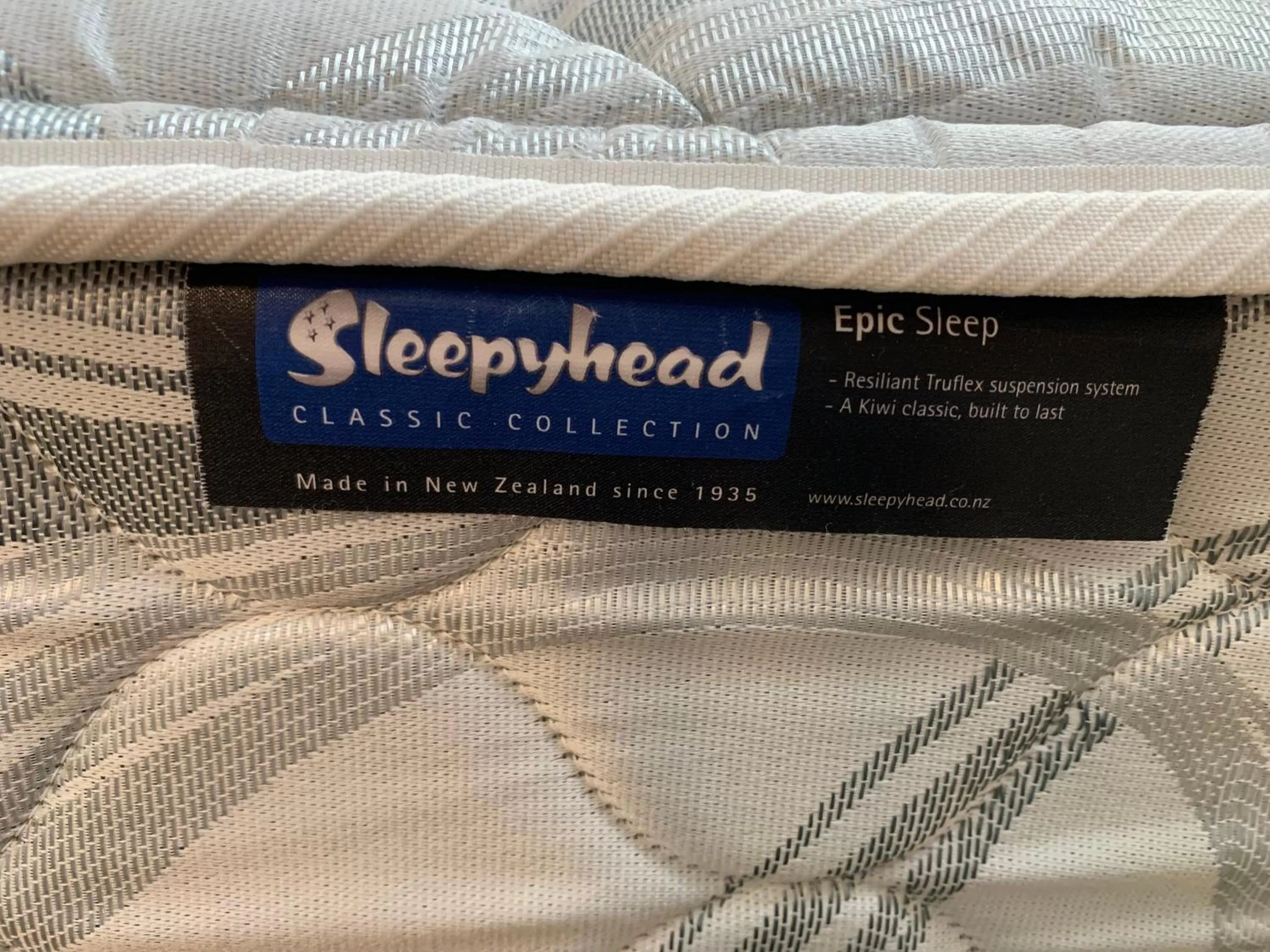 Bed in 755 Regal Court Motel