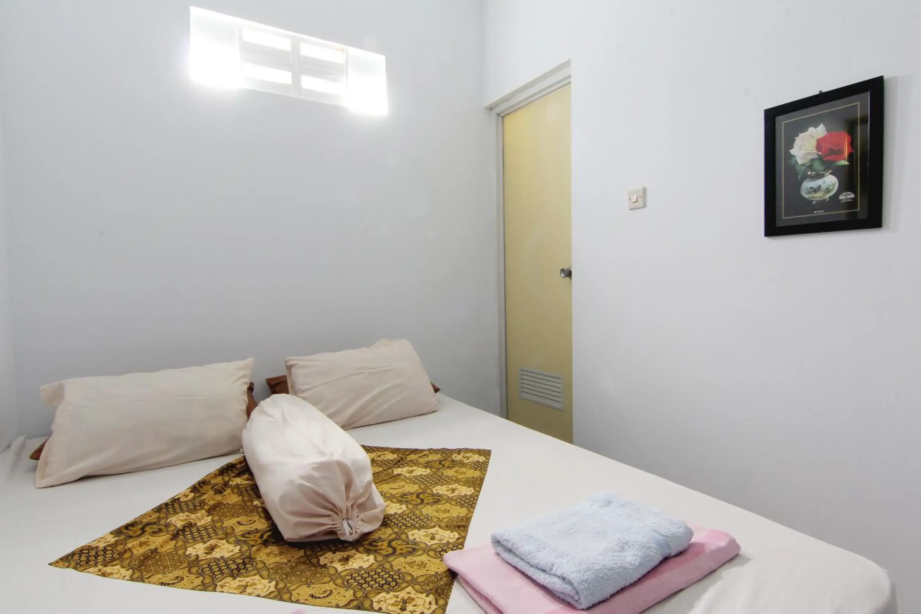 Photo of the whole room, Bed in Tiga Dua Homestay