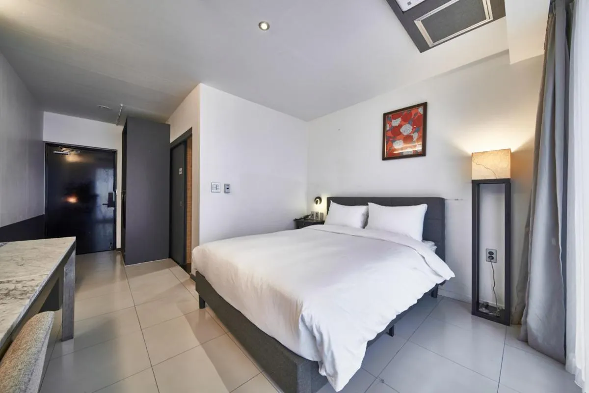 Bed in Lareem Boutique Hotel