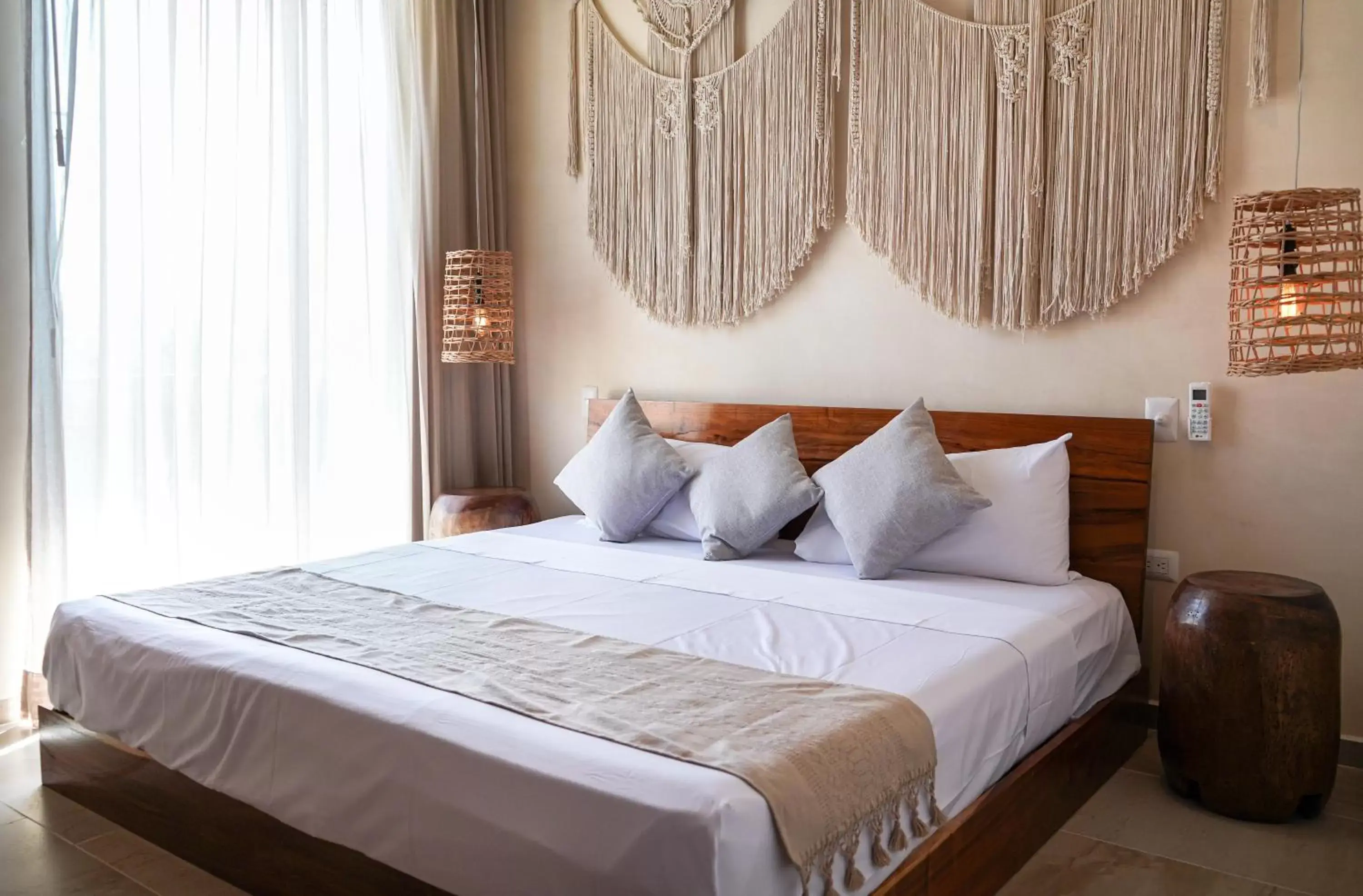 Bed in ARUNA TULUM-Luxury Studios & Apartments