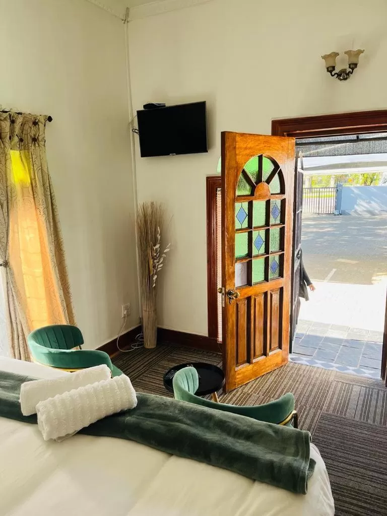 Seating area, Bed in St Eve Lodge & Spa