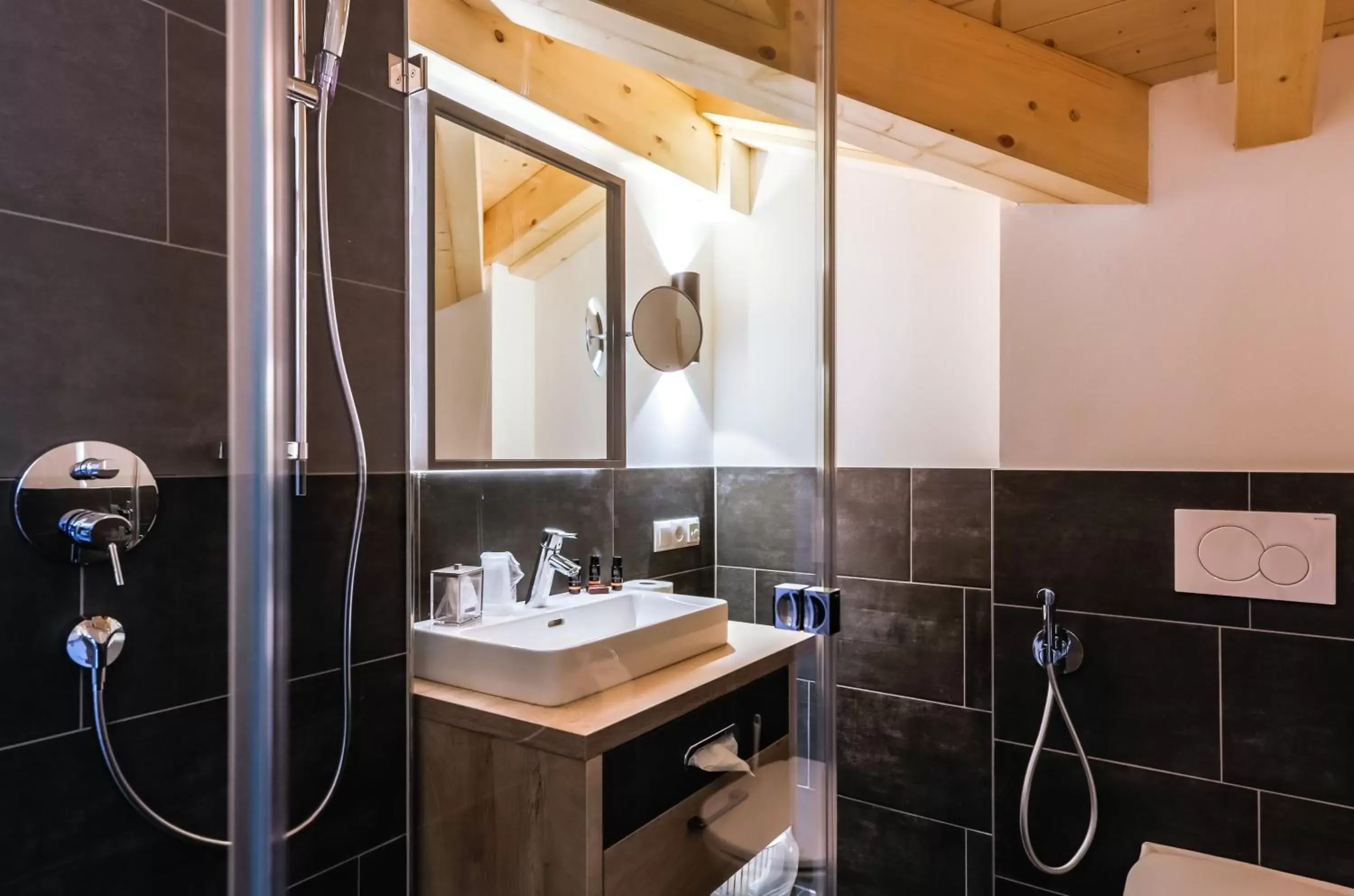 Bathroom in 24 by AvenidA Hotel & Residences Kaprun