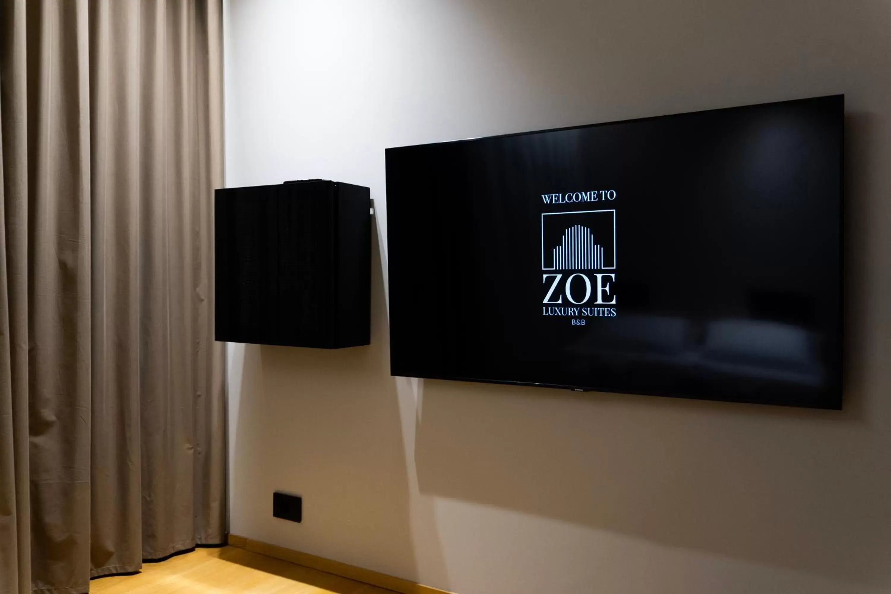 TV and multimedia, TV/Entertainment Center in ZOE LUXURY SUITES