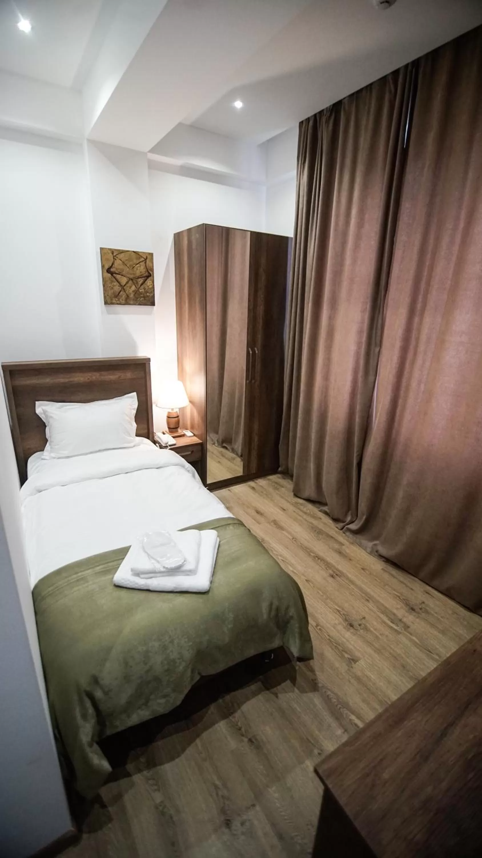 Bed in Hotel King Tom