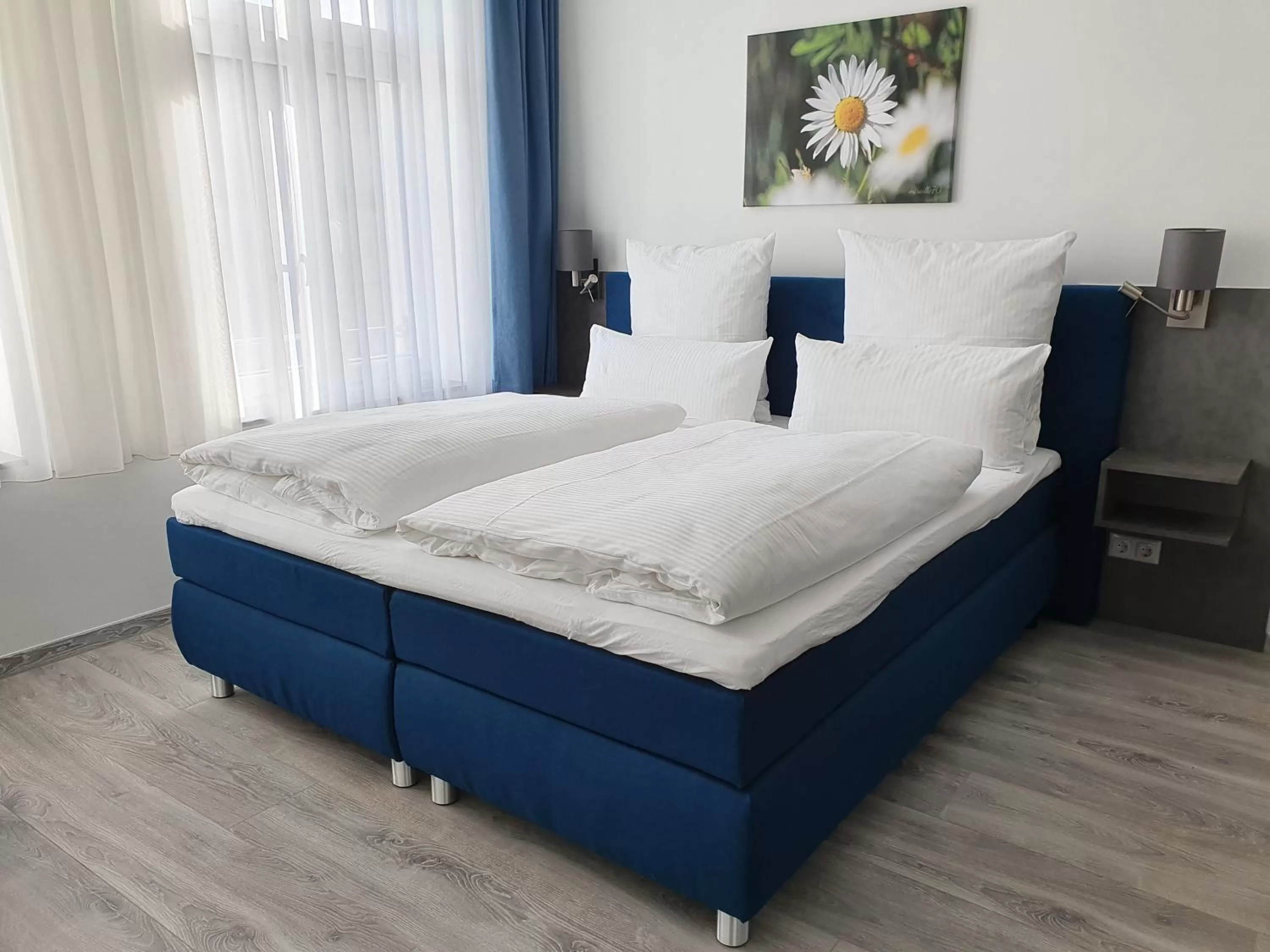 Photo of the whole room, Bed in Hotel Hanseat Stralsund