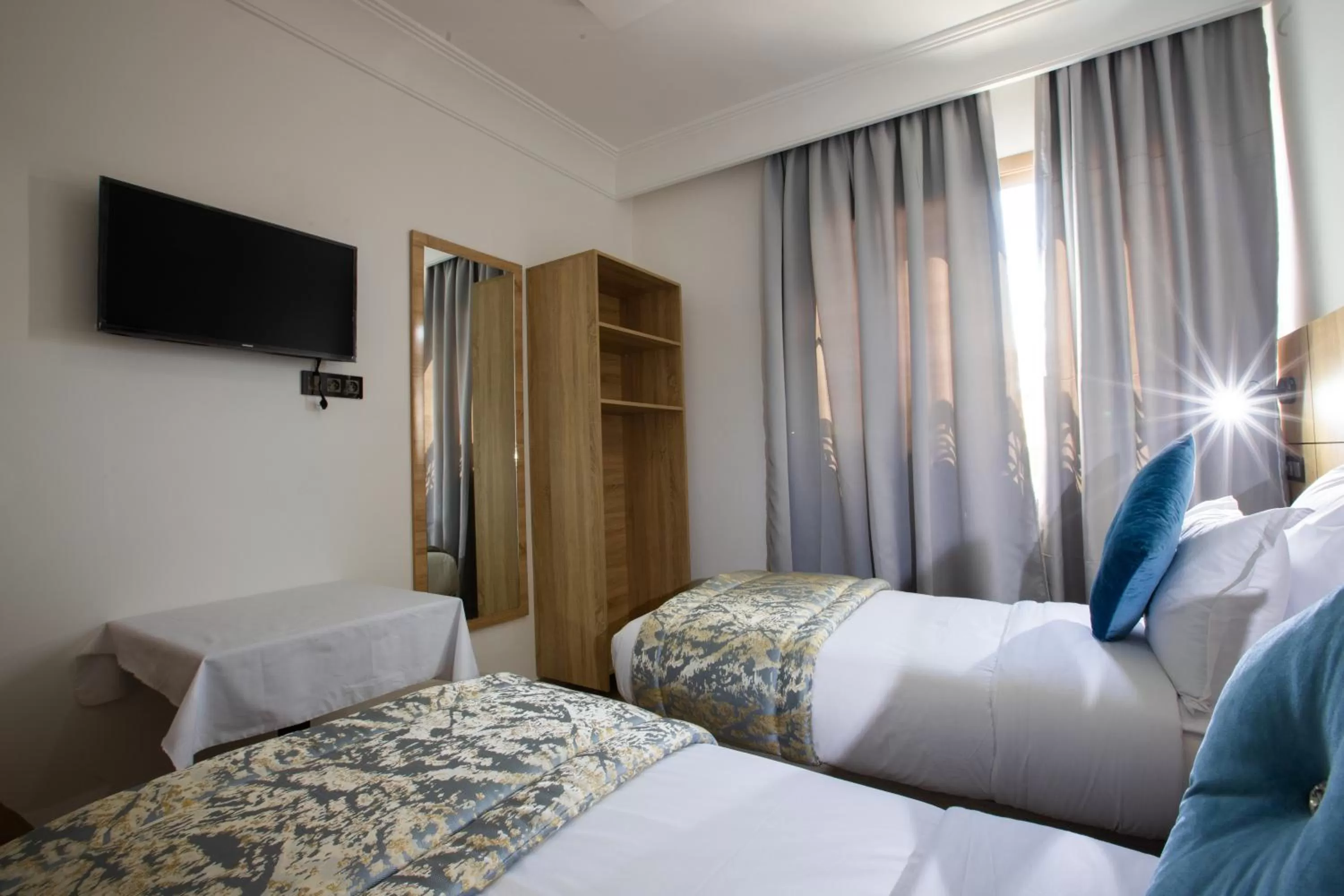 Bed in Karam City Hotel