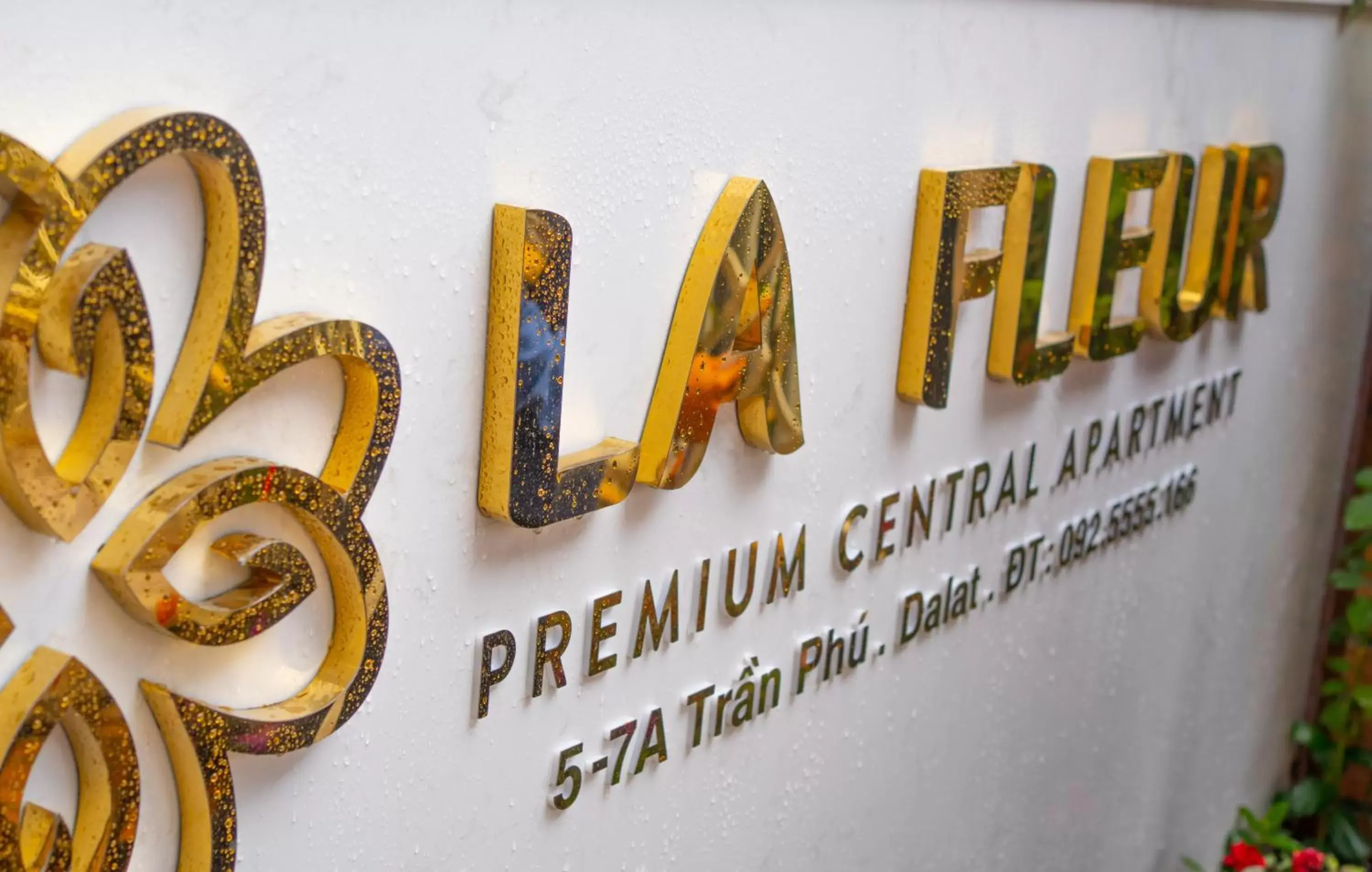 Property logo or sign in La Fleur Premium Central Apartment