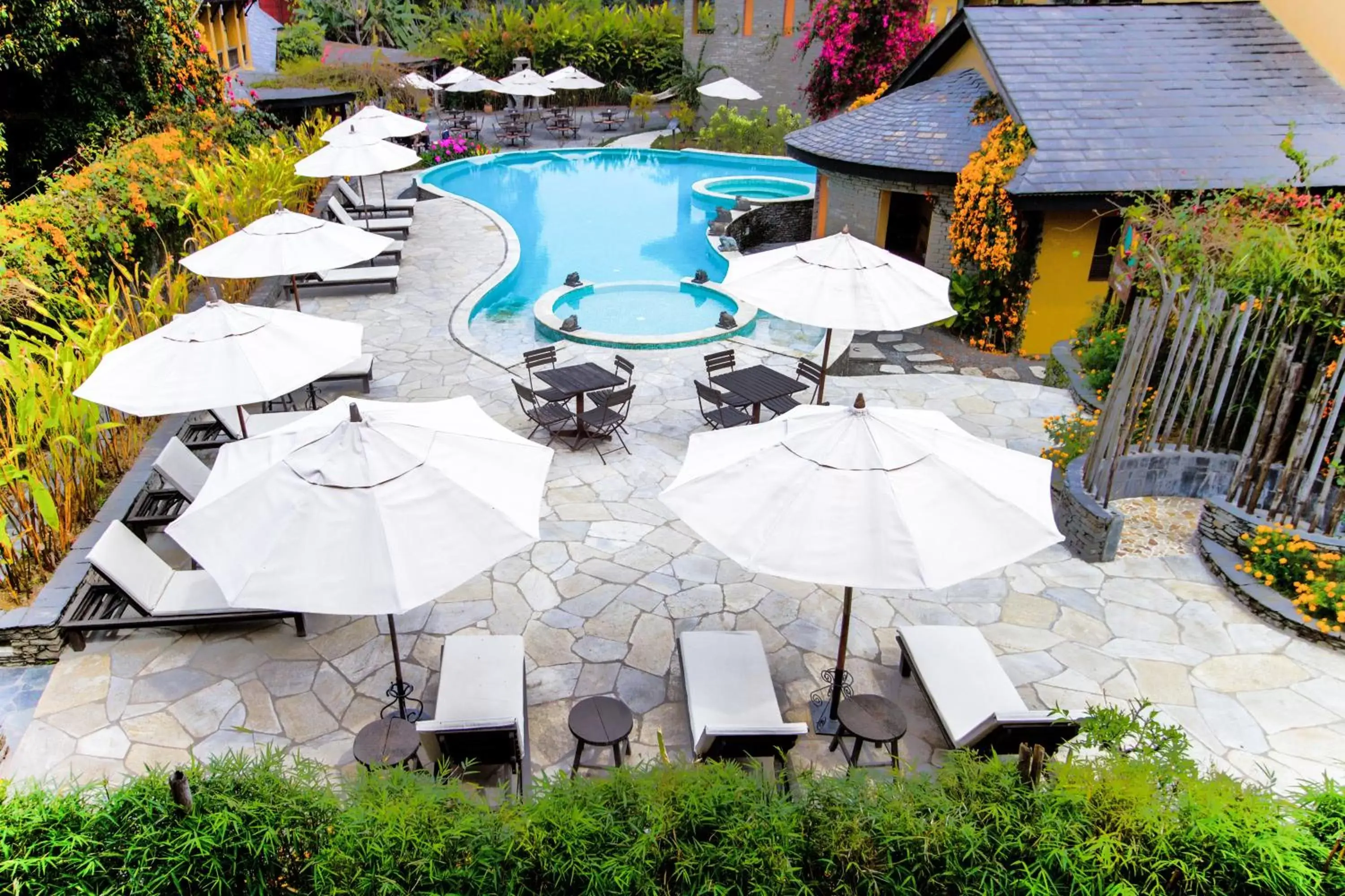 Patio, Pool View in Temple Tree Resort & Spa