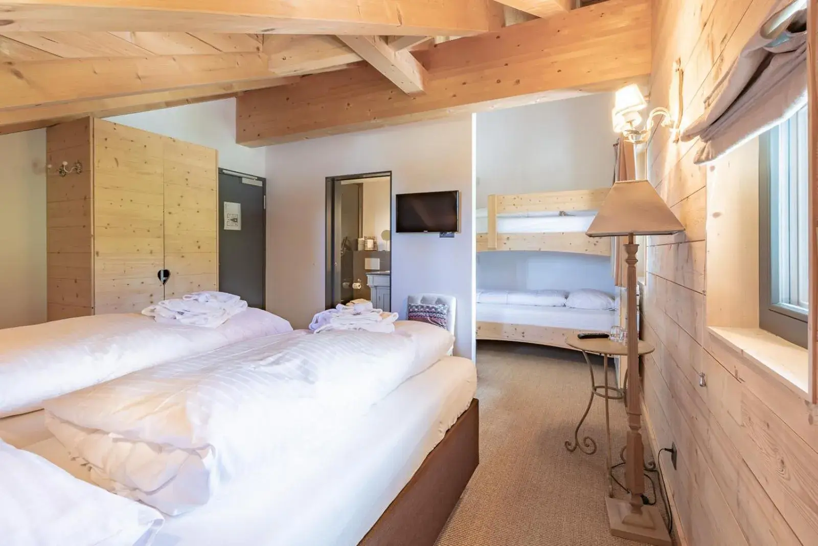 Bedroom in Rinderberg Swiss Alpine Lodge