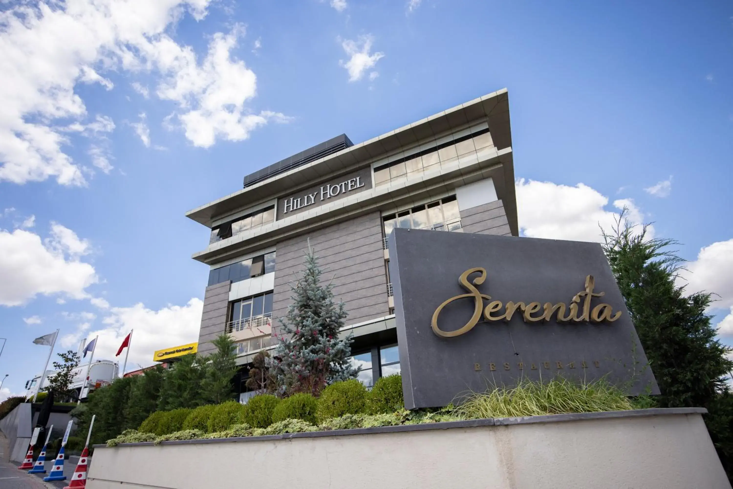 Property building in Hilly Hotel Property building in Hilly Hotel