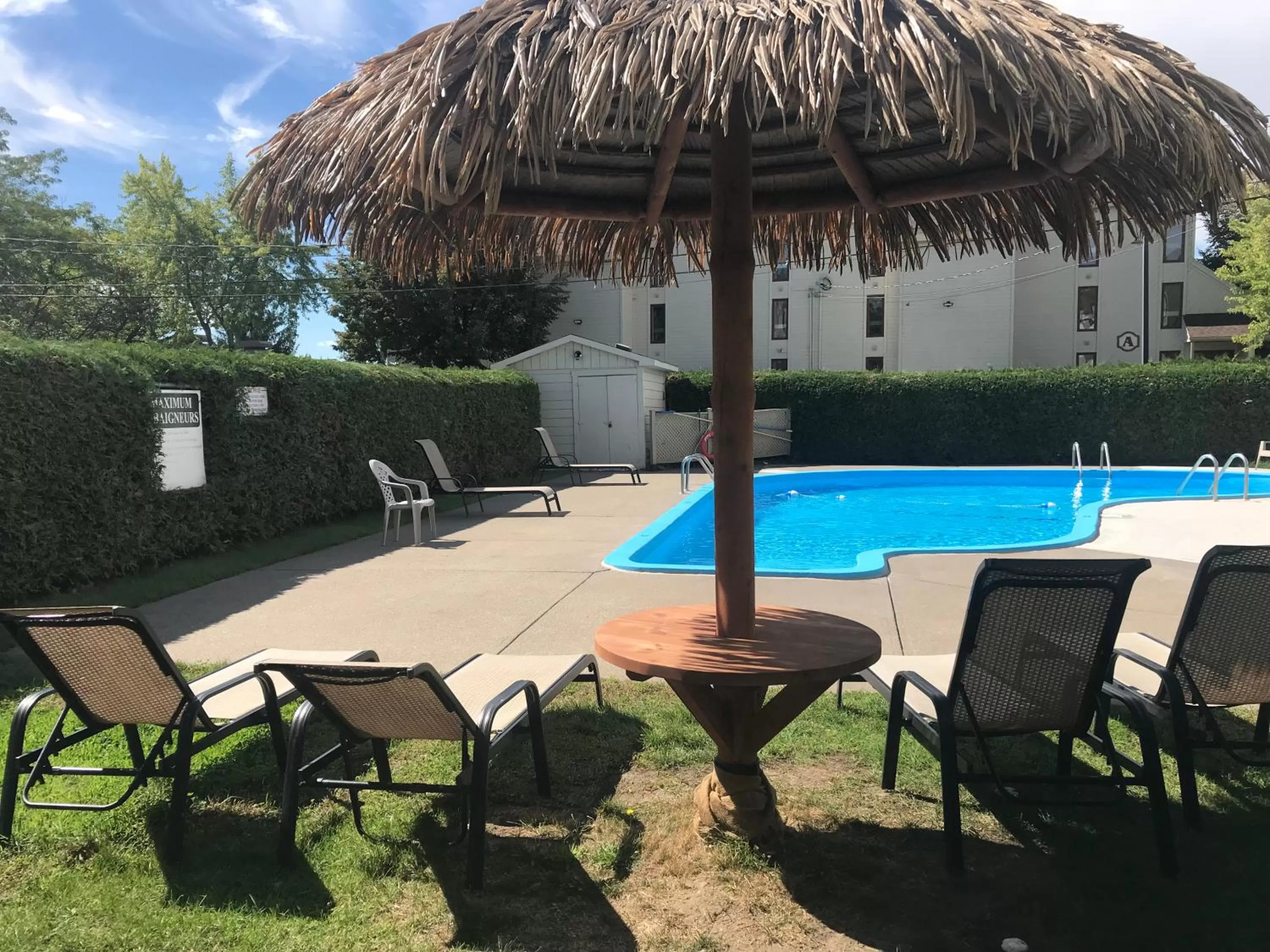 Swimming pool in Magog Waterfront Condo