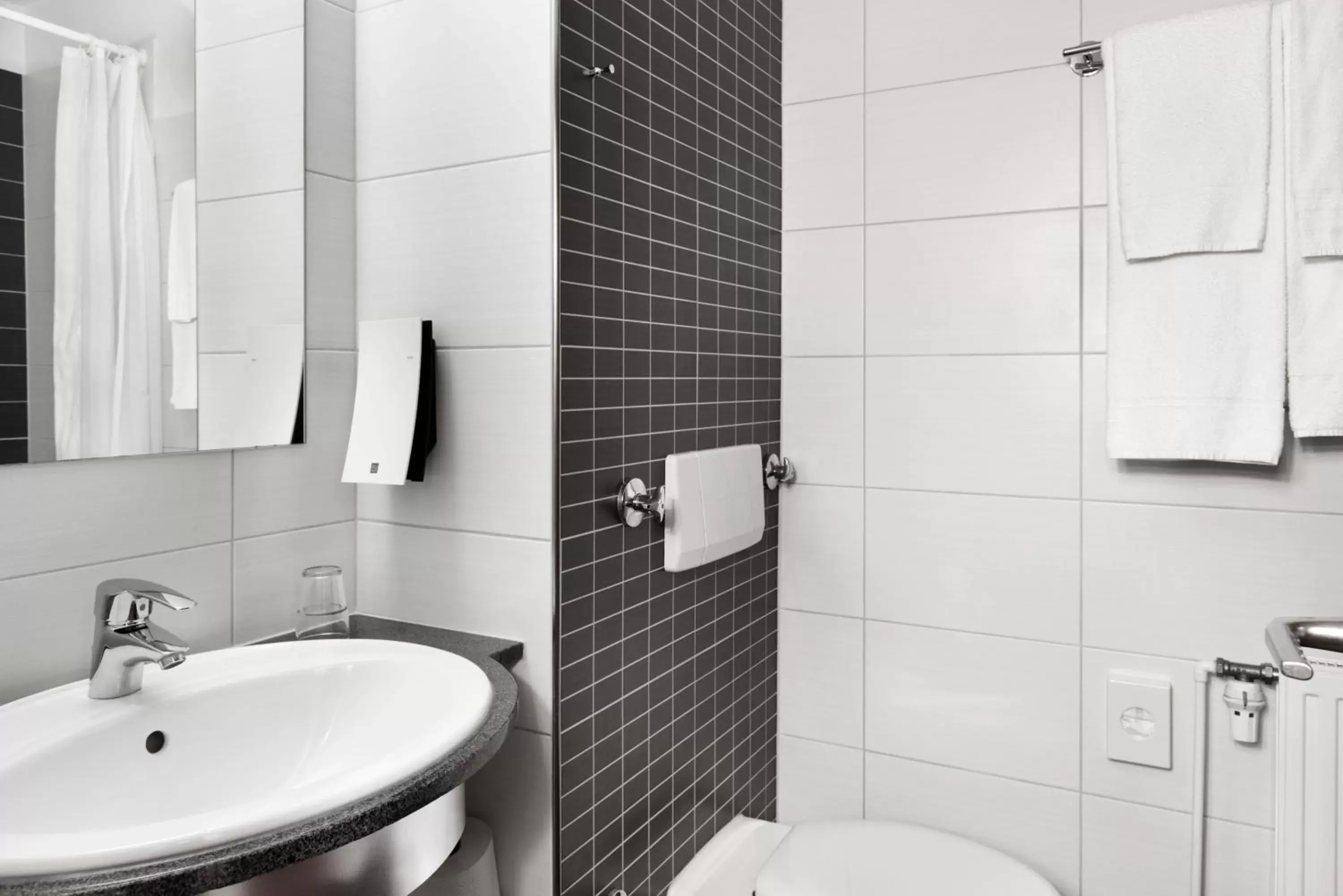 Bathroom in Tryp by Wyndham Luebeck Aquamarin