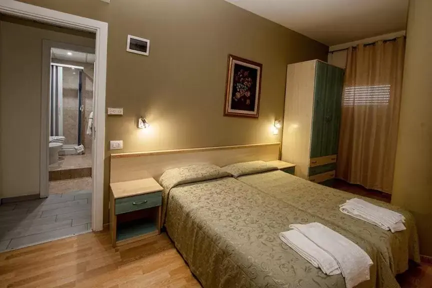 Bed in Hotel Scacciapensieri